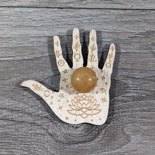 Hand with lotus crystal ball display stand