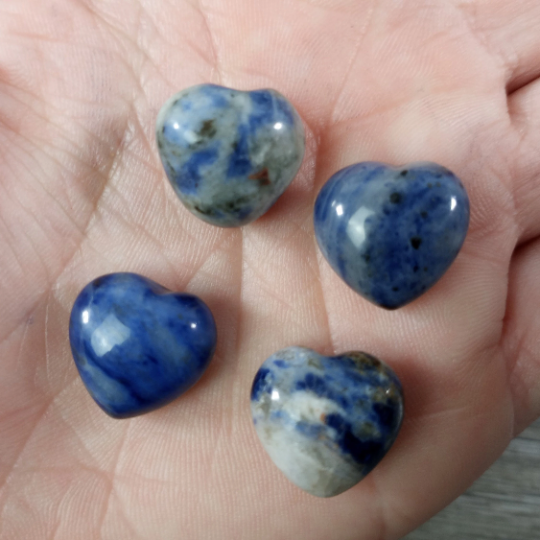 Sodalite healing heart-shaped stones