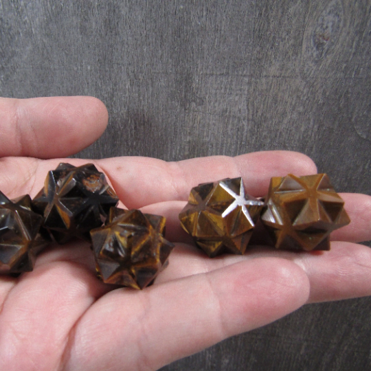 tiger eye Sacred geometry Merkaba crystal display for metaphysical stores