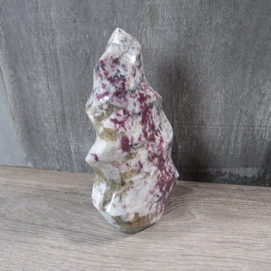 pink tourmaline in quartz crystal shop decor flame display piece