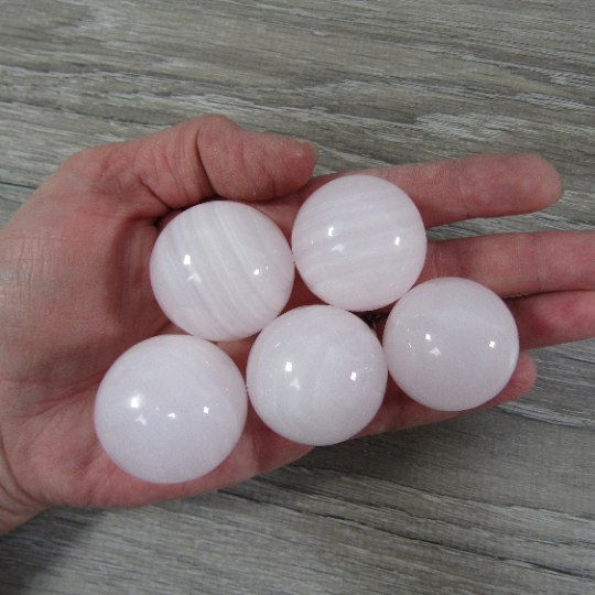 pink mangano calcite wholesale crystal spheres