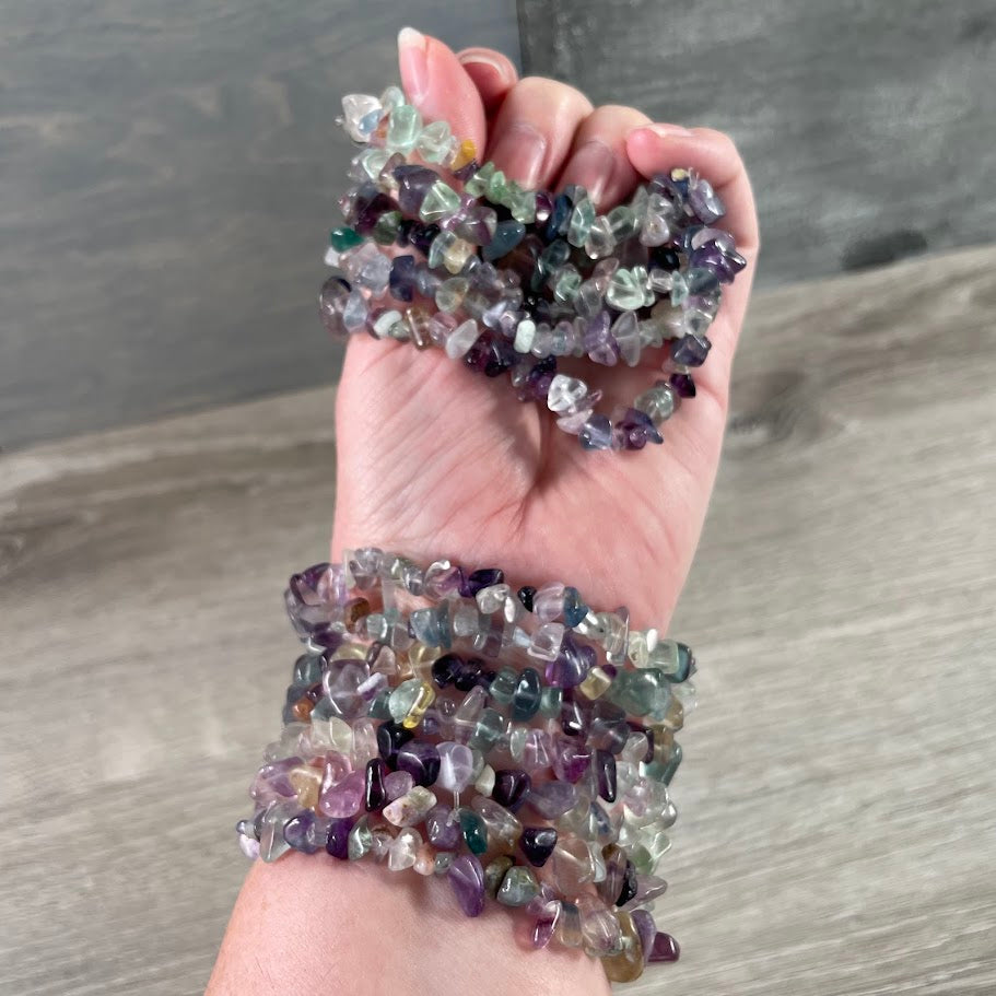 Fluorite gemstone chip bracelets with natural polished stone textures for retail shops