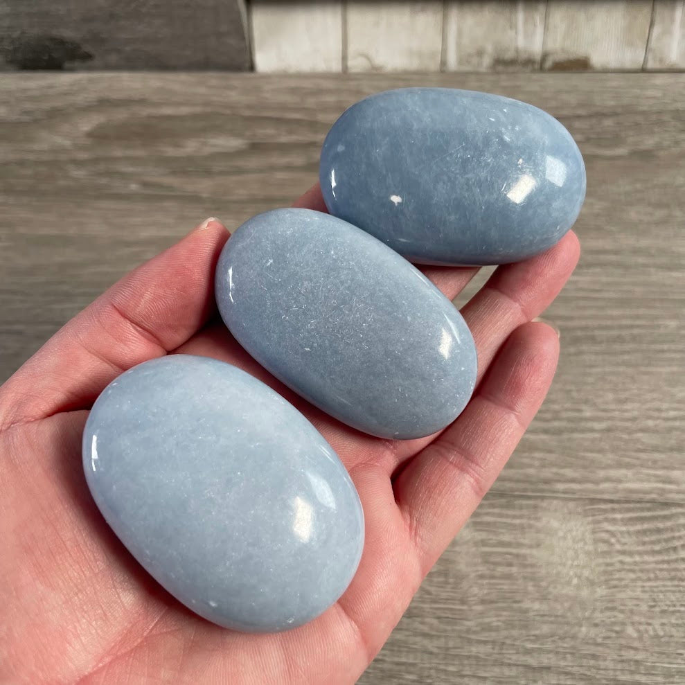Polished crystal palm stones bulk angelite gemstones for metaphysical shops
