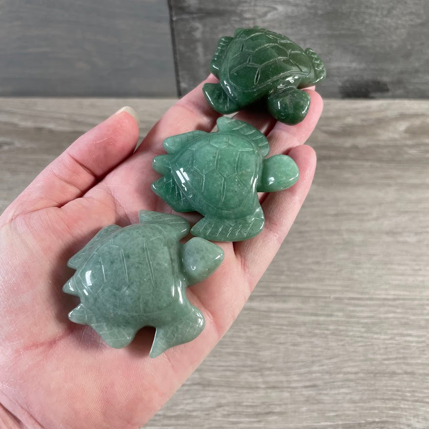 Carved green aventurine turtle crystal figurine for metaphysical shops, boutiques, and coastal décor displays.