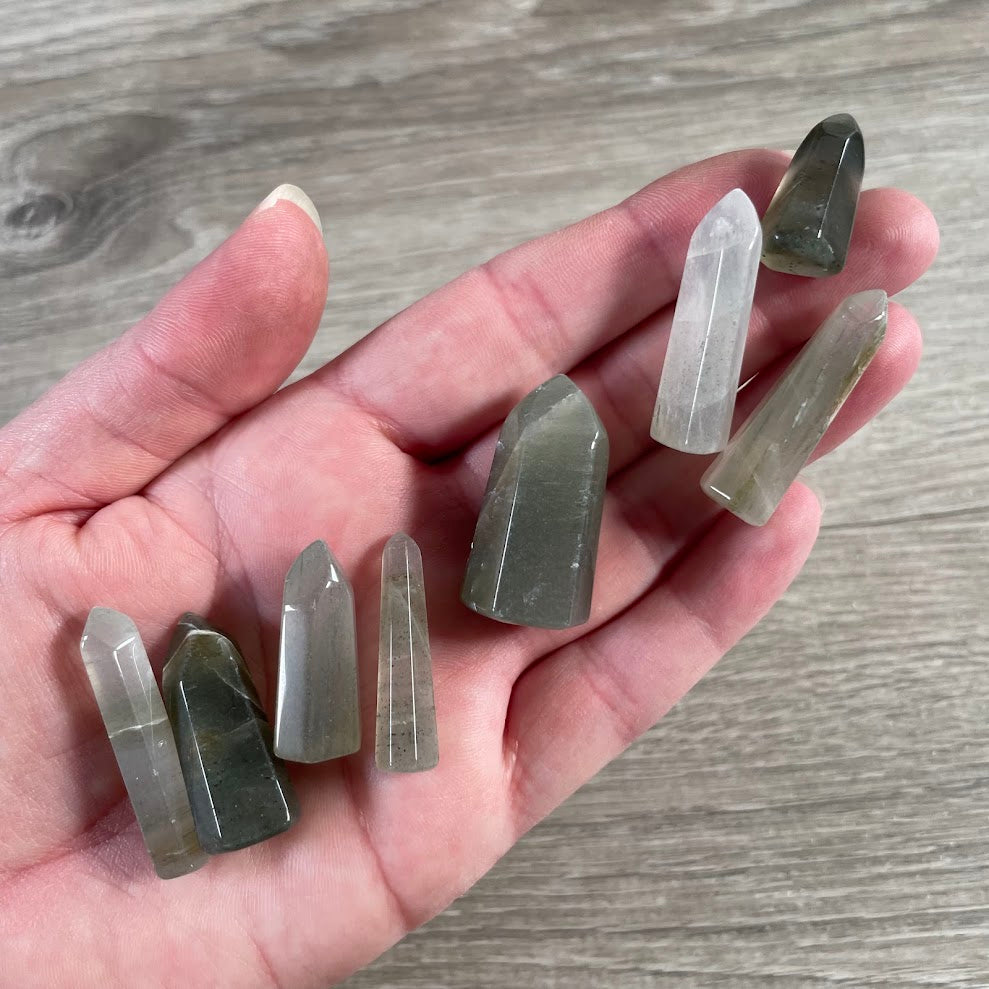 Handmade green included quartz crystal tower from Brazil crafted from natural polished gemstone.