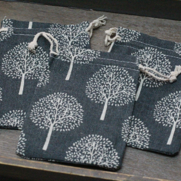 Earthy burlap bag with Tree of Life print for wholesale resale and bulk orders