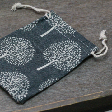 Eco-friendly gemstone pouch made of burlap with secure drawstring closure