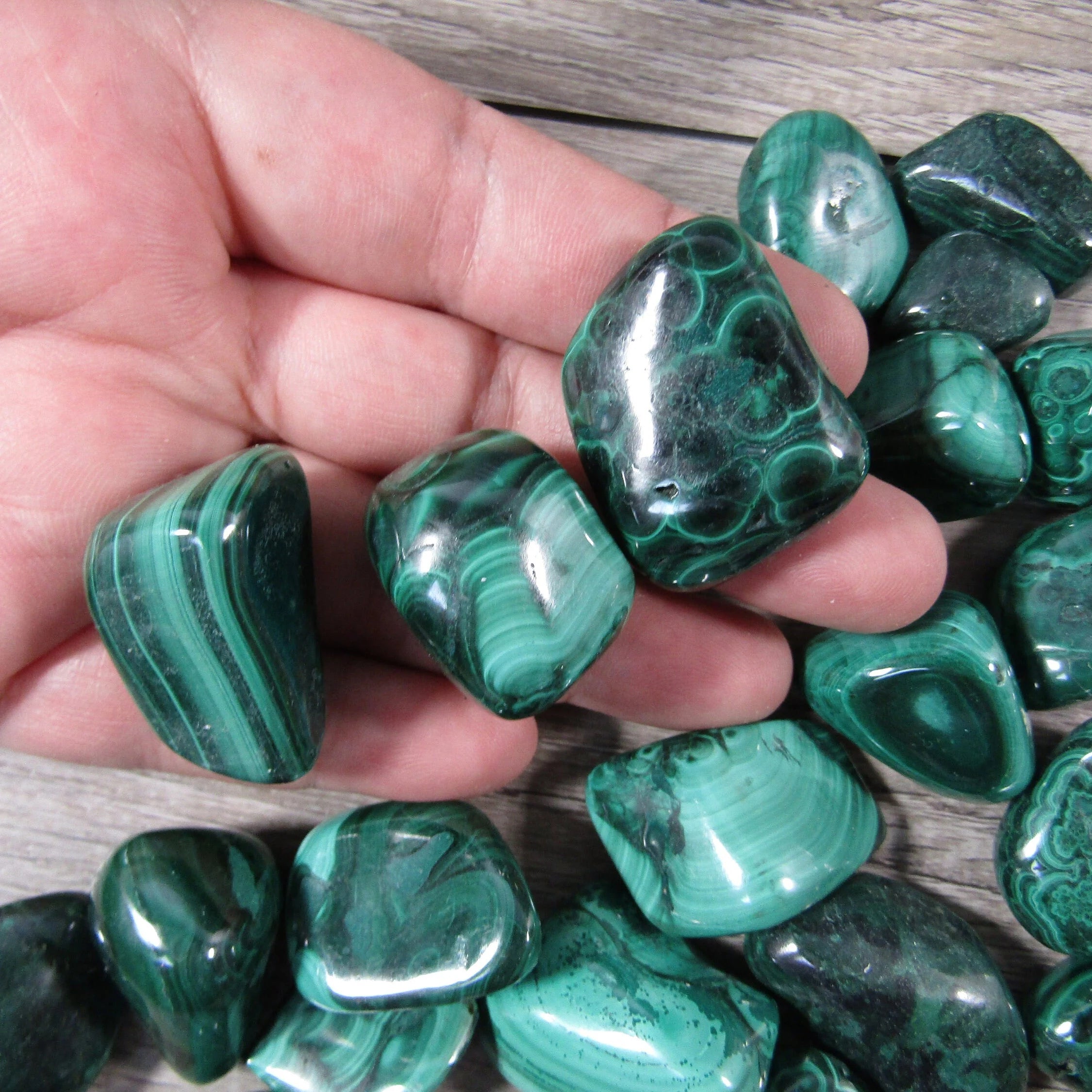 Polished green Malachite stones sold by the pound wholesale