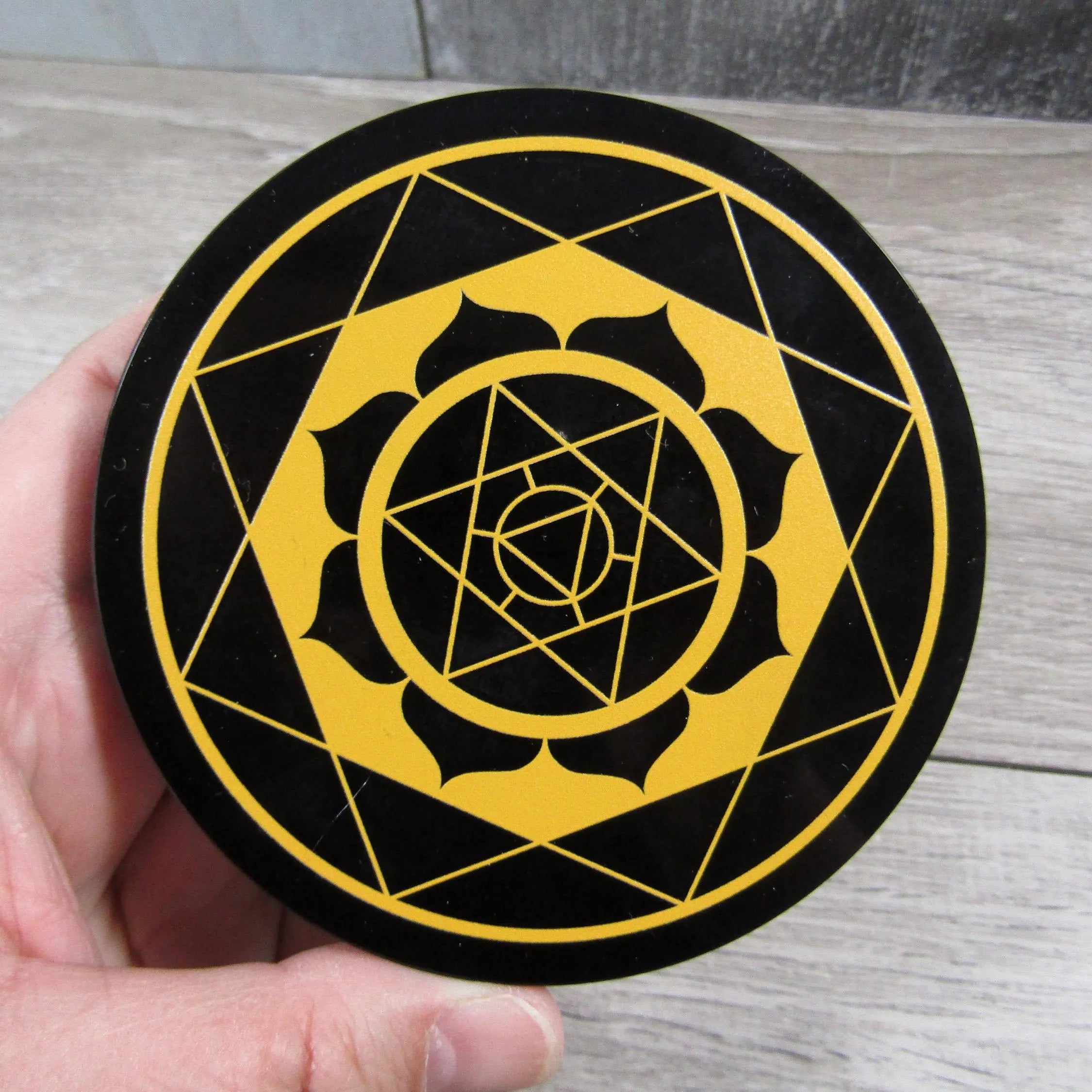 merkaba meditaiton tool, gold etching on black obsidian