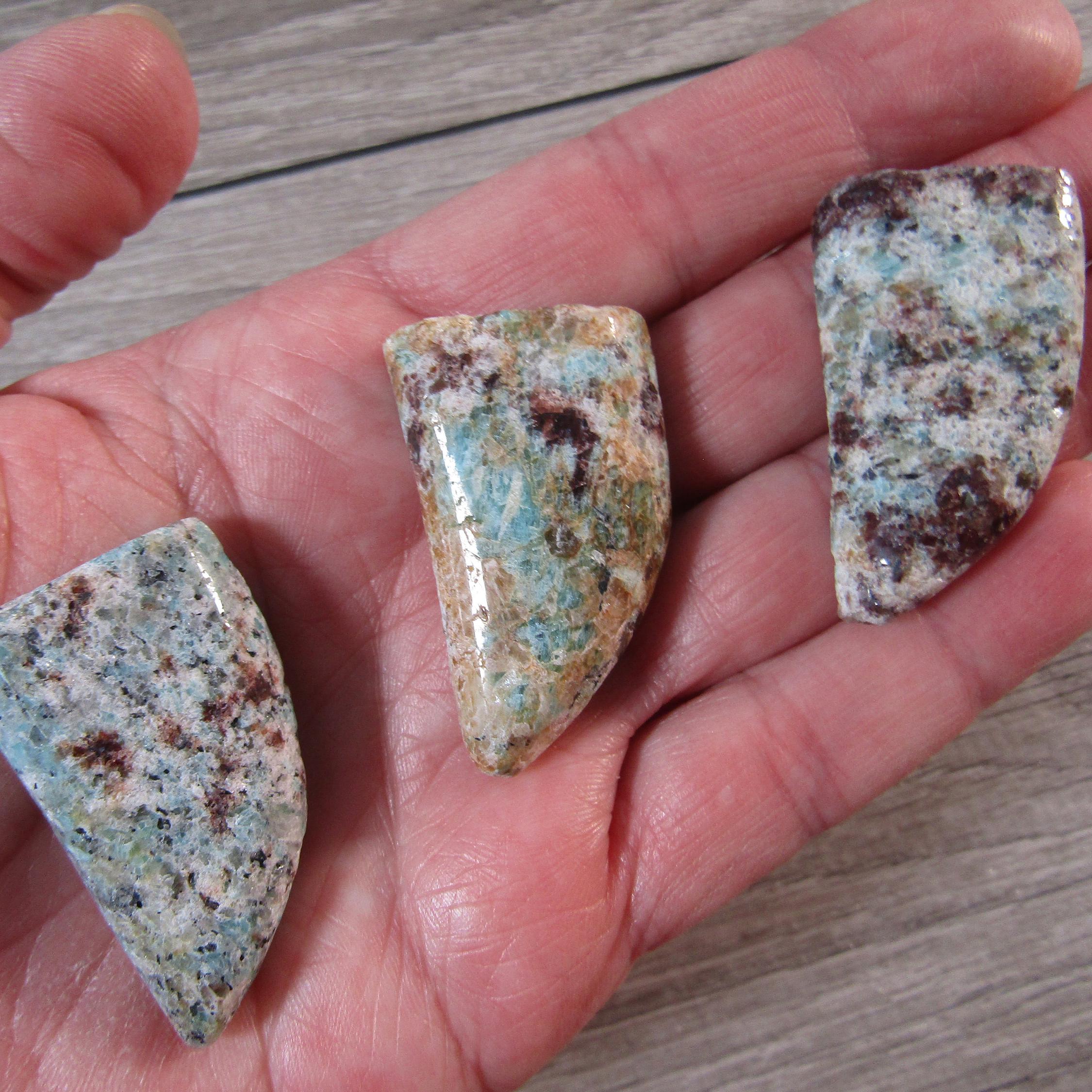 Hand-carved masculine mosaic amazonite design on display