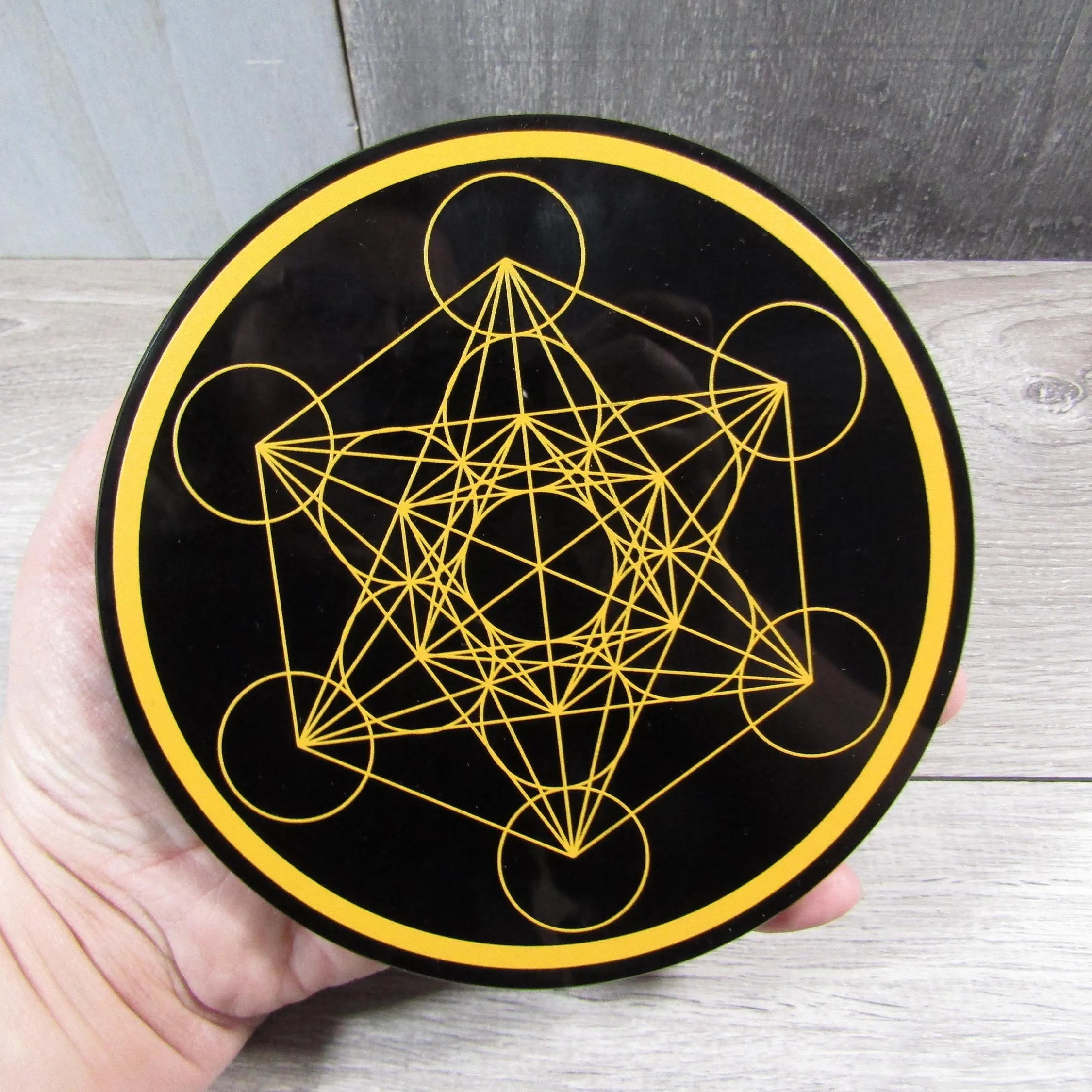 ancient geormety tool etched obsidian disk