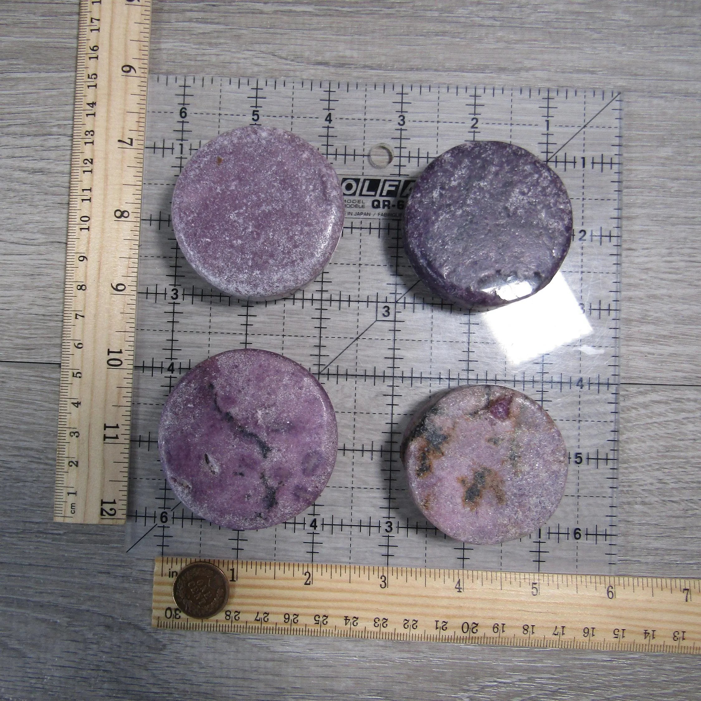 lepidolite thick round gemstone crystal disk for metaphysical use