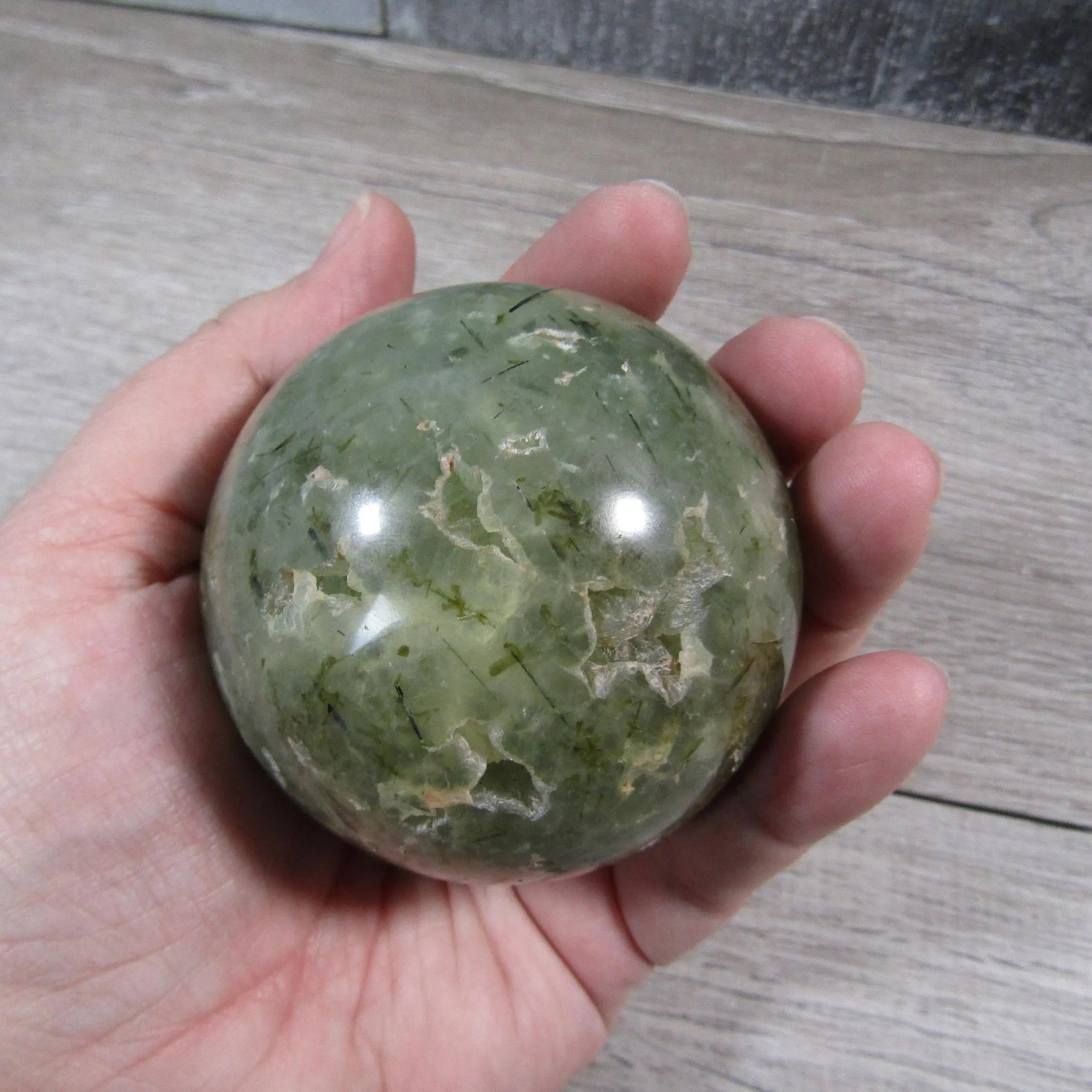 Prehnite sphere for crystal display