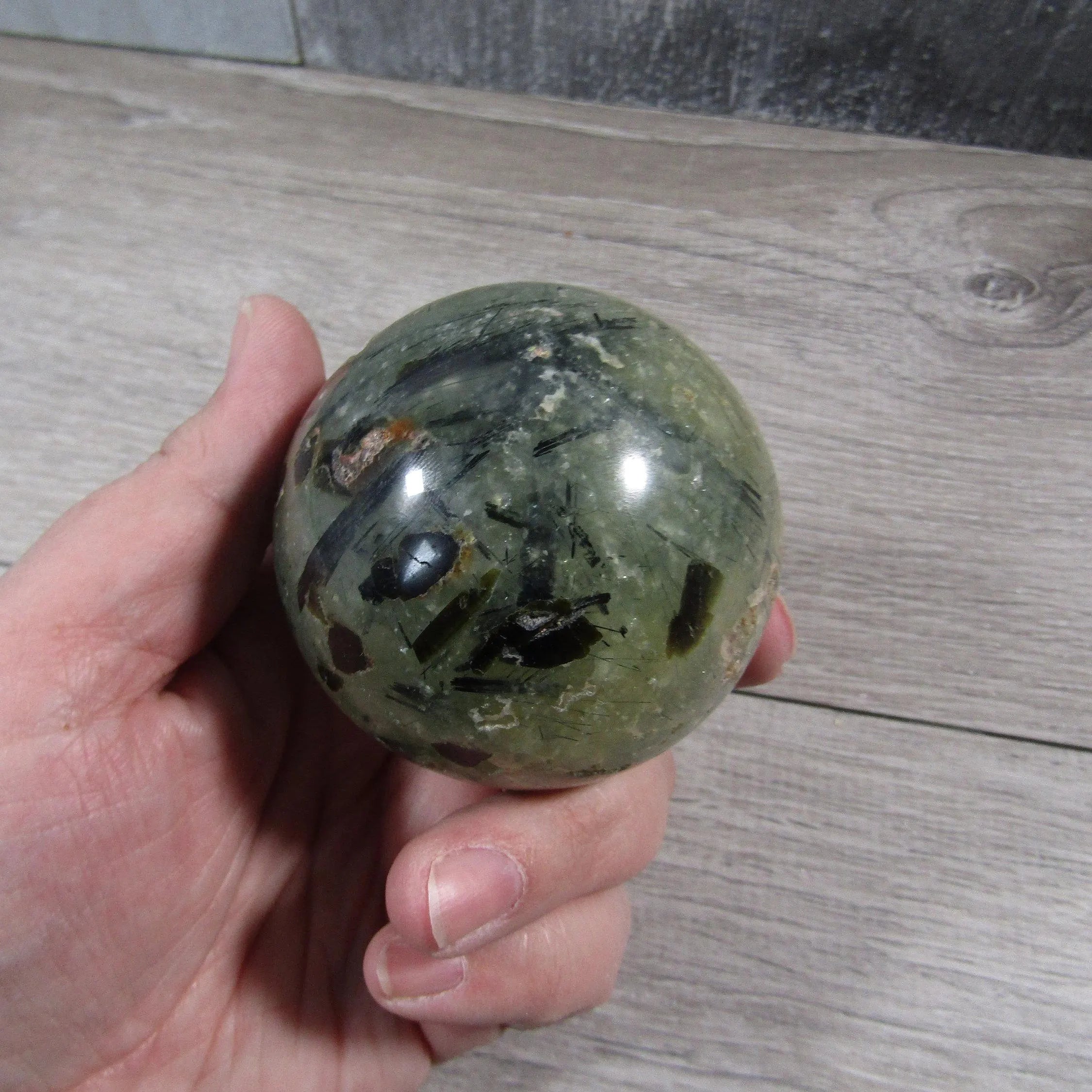 Prehnite sphere for energy healing and gift shops
