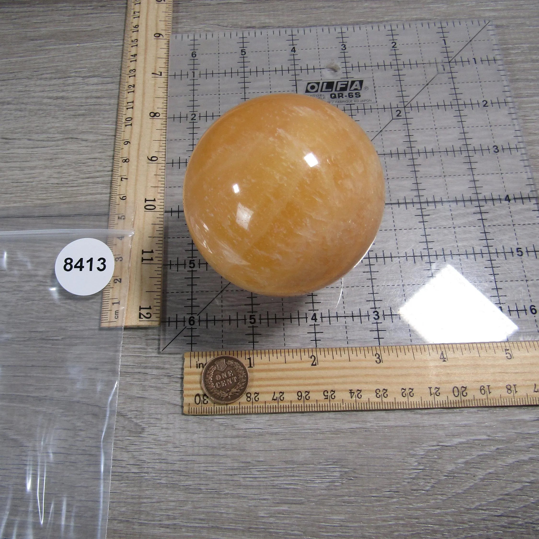 Orange Calcite sphere for energy healing retail