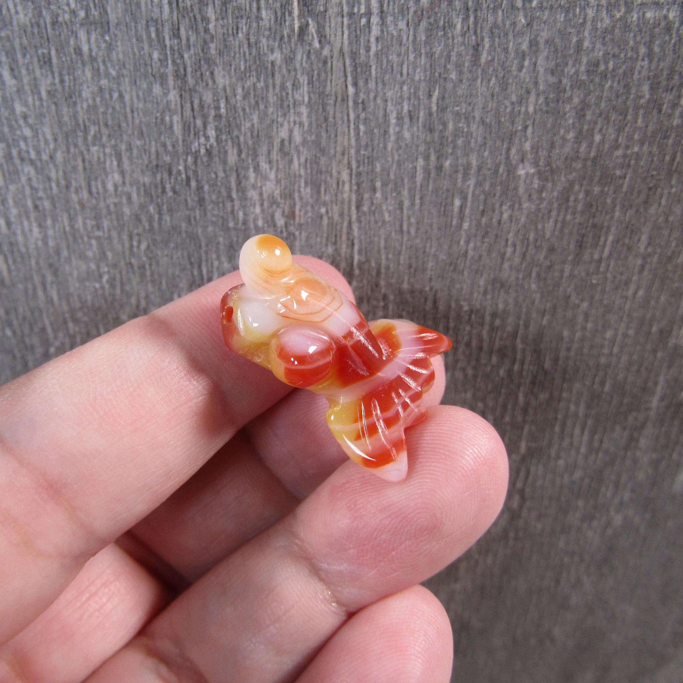 Fish-shaped gemstone beads.