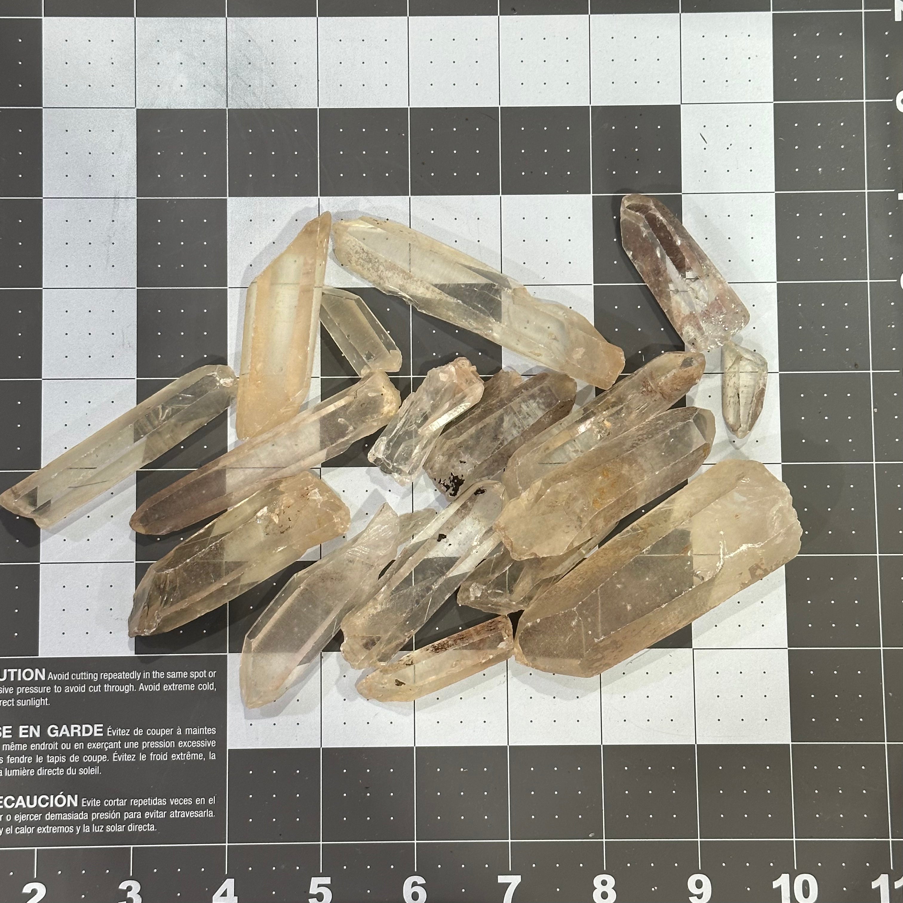 Bulk lot of raw quartz points for metaphysical shops