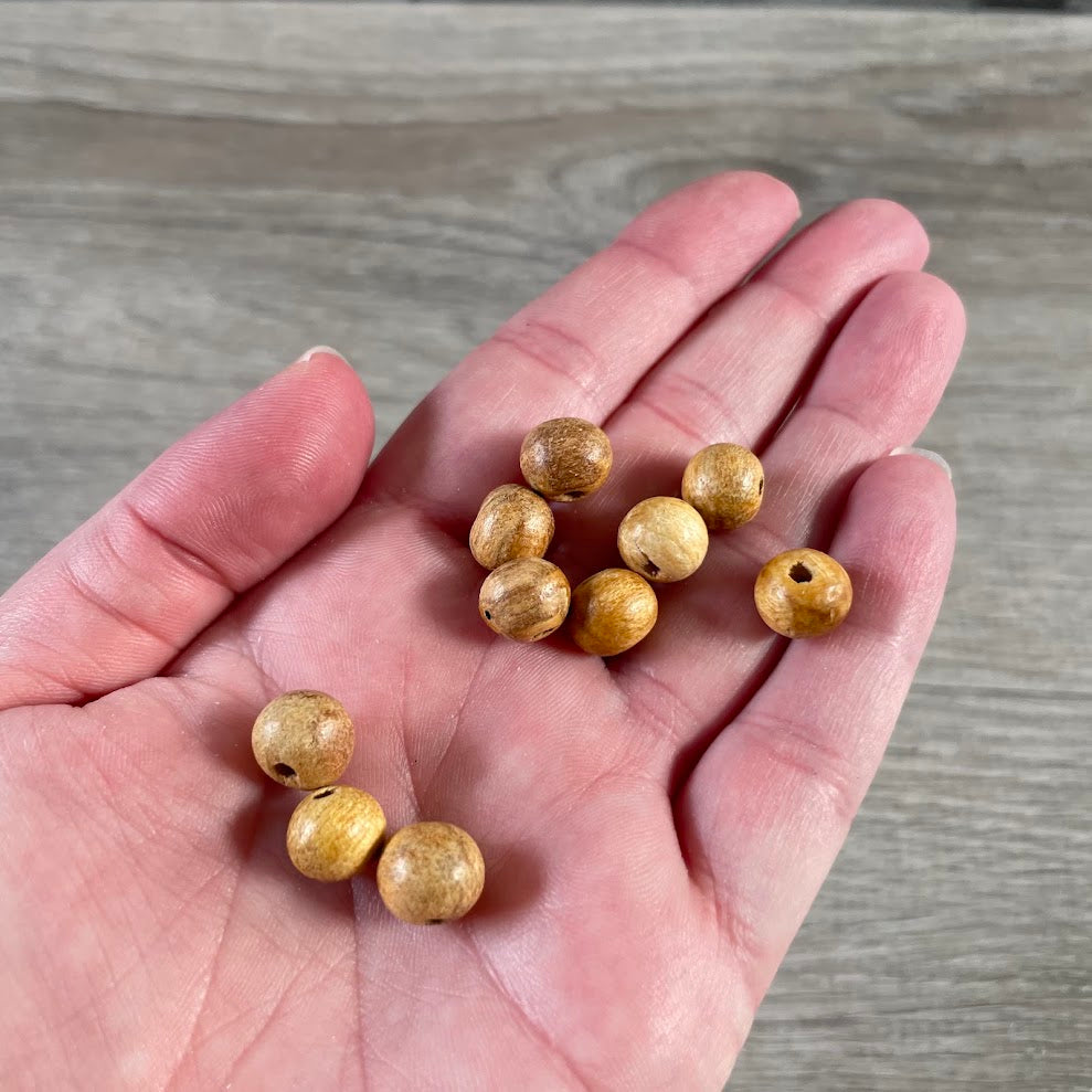 Bulk natural Palo Santo beads for spiritual wellness and ritual retailers