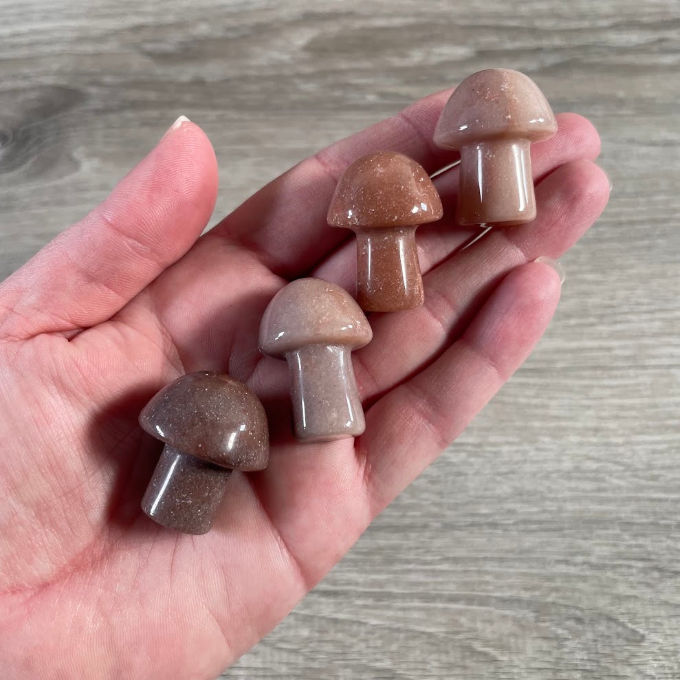 Hand carved red aventurine crystal mushroom figurines wholesale gift shop inventory