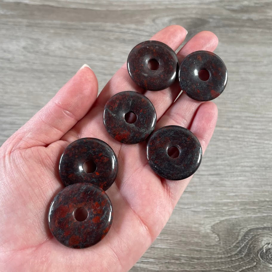 red jasper crystal donut pendant spiritual meaning
