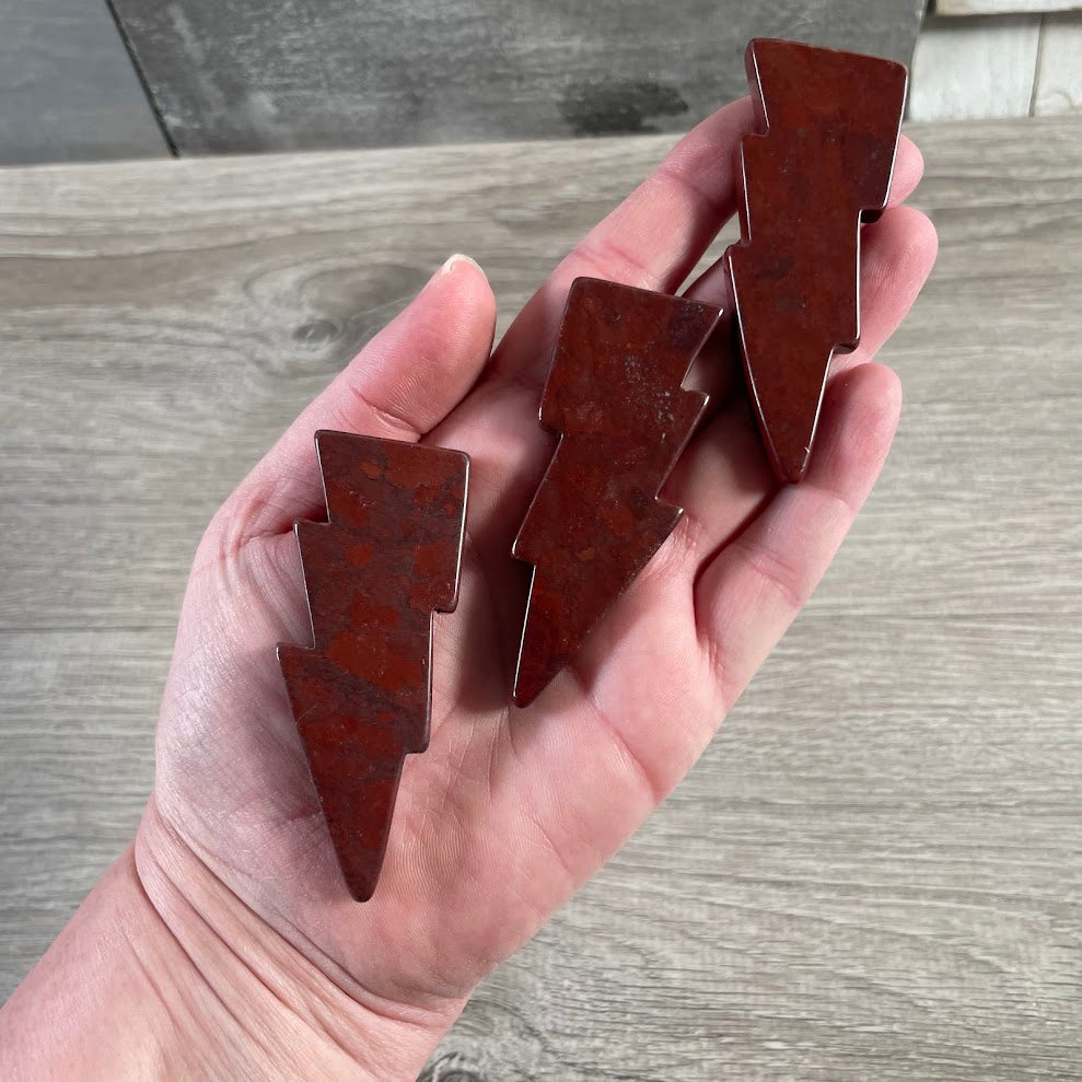 Red jasper lightning bolt figurines crystal store inventory
