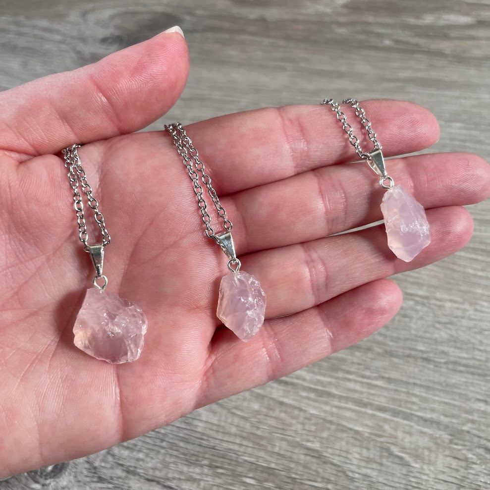 Natural rose quartz pendant necklace with raw pink gemstone