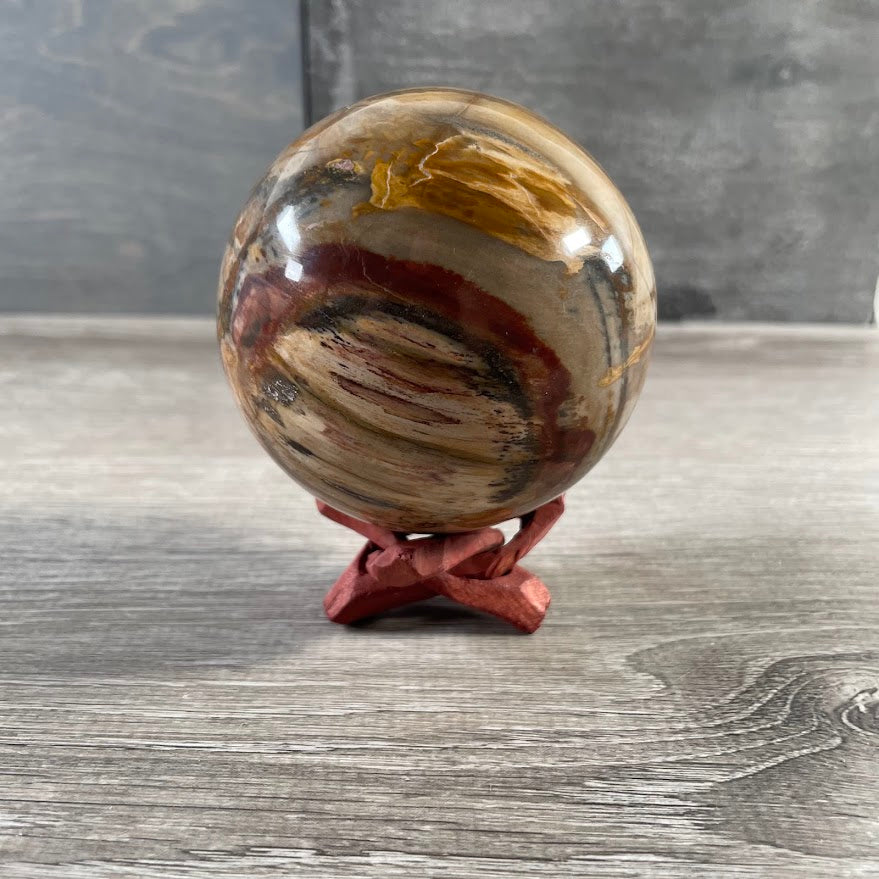 Wooden tripod holder for mineral specimens, fossils, and collectible stones