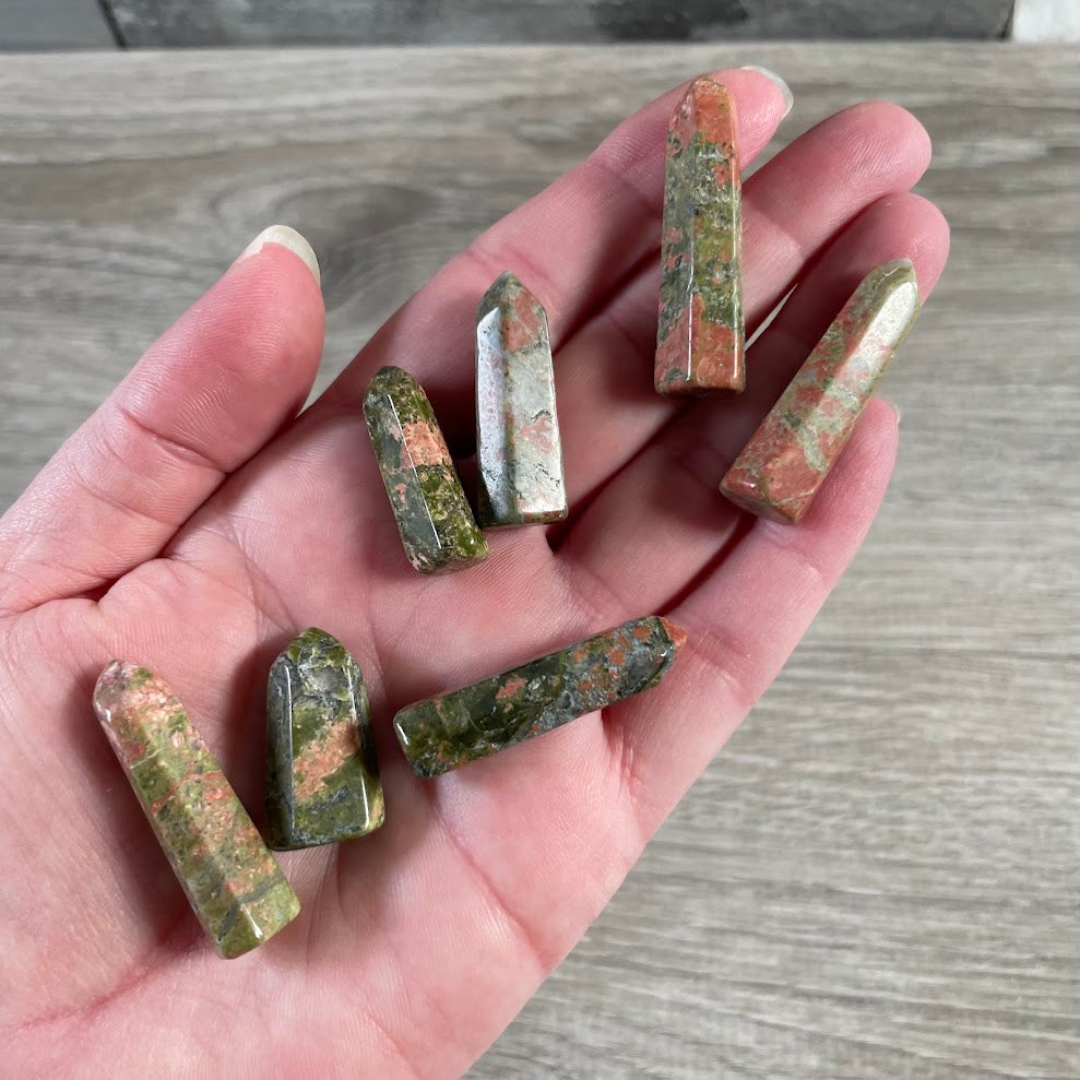 Small unakite polished crystal obelisk handmade in Brazil from natural gemstone.