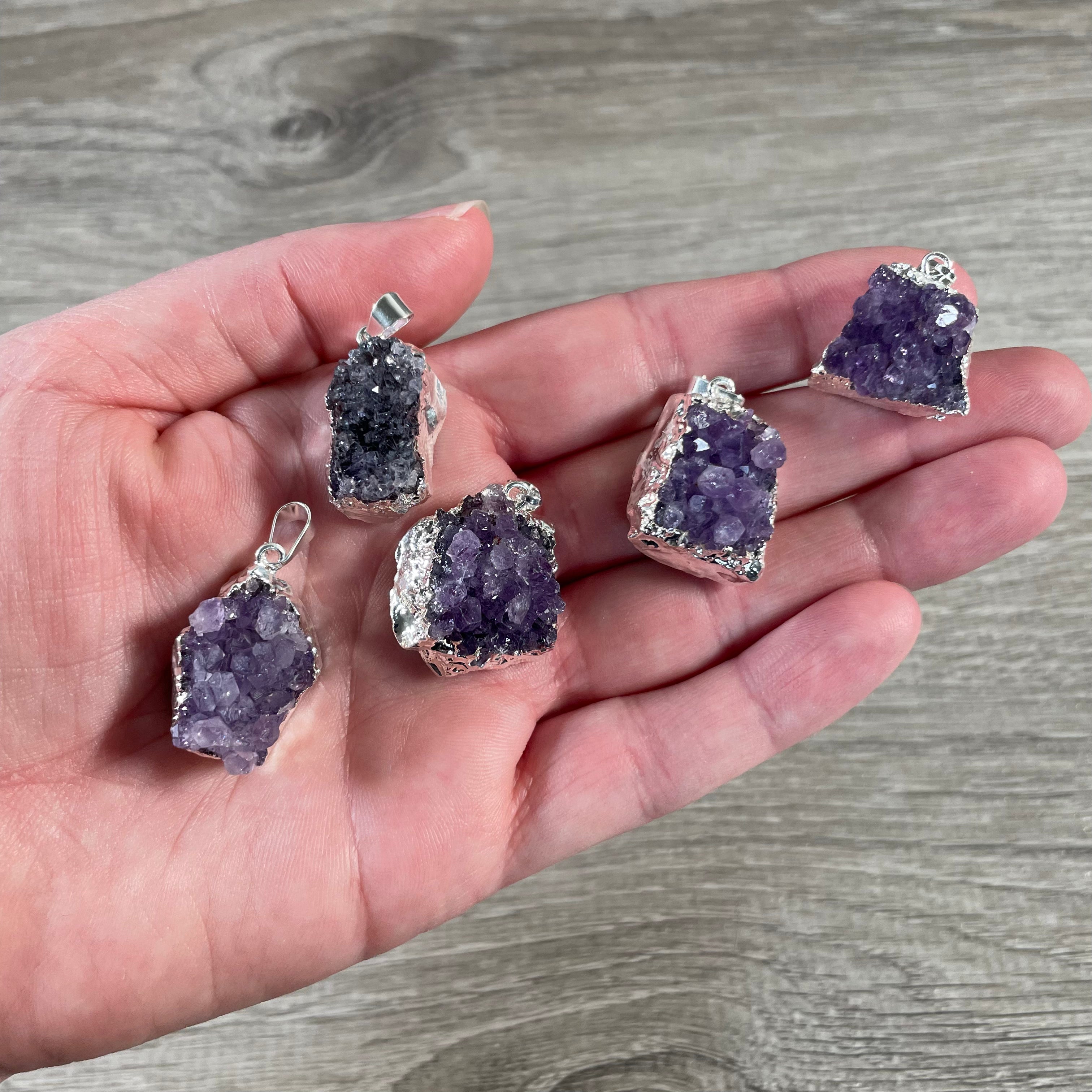 raw amethyst cluster pendant with electroplated edges for resale