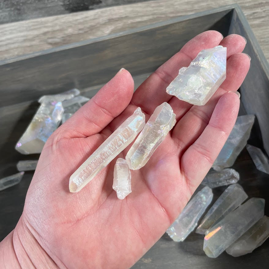 Bulk raw Angel Aura Quartz points with rainbow iridescent finish for resale