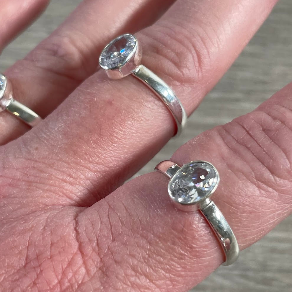 Wholesale sterling silver cubic zirconia rings with sparkling CZ stones for jewelry boutiques