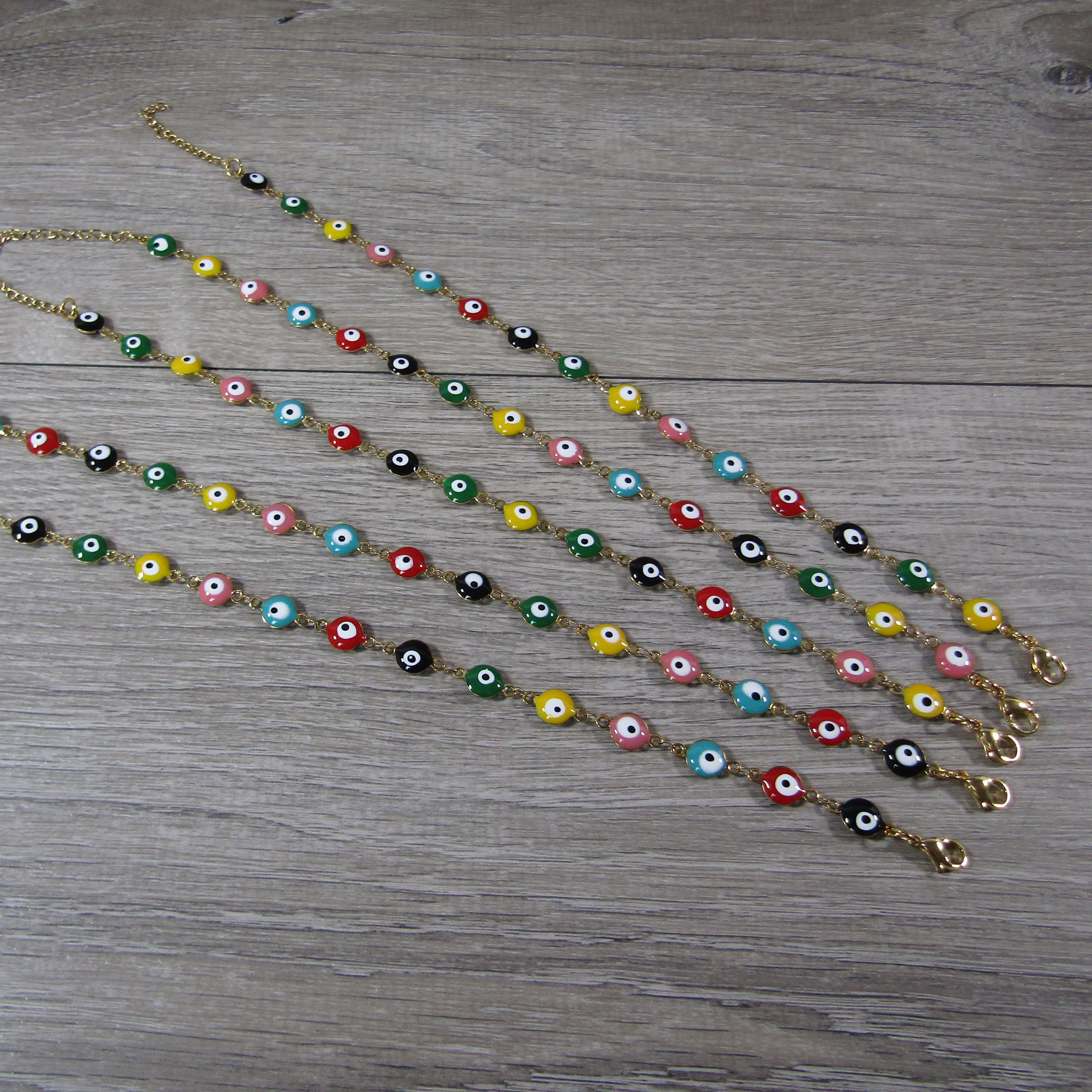 Fashionable evil eye bracelet with gold-tone finish