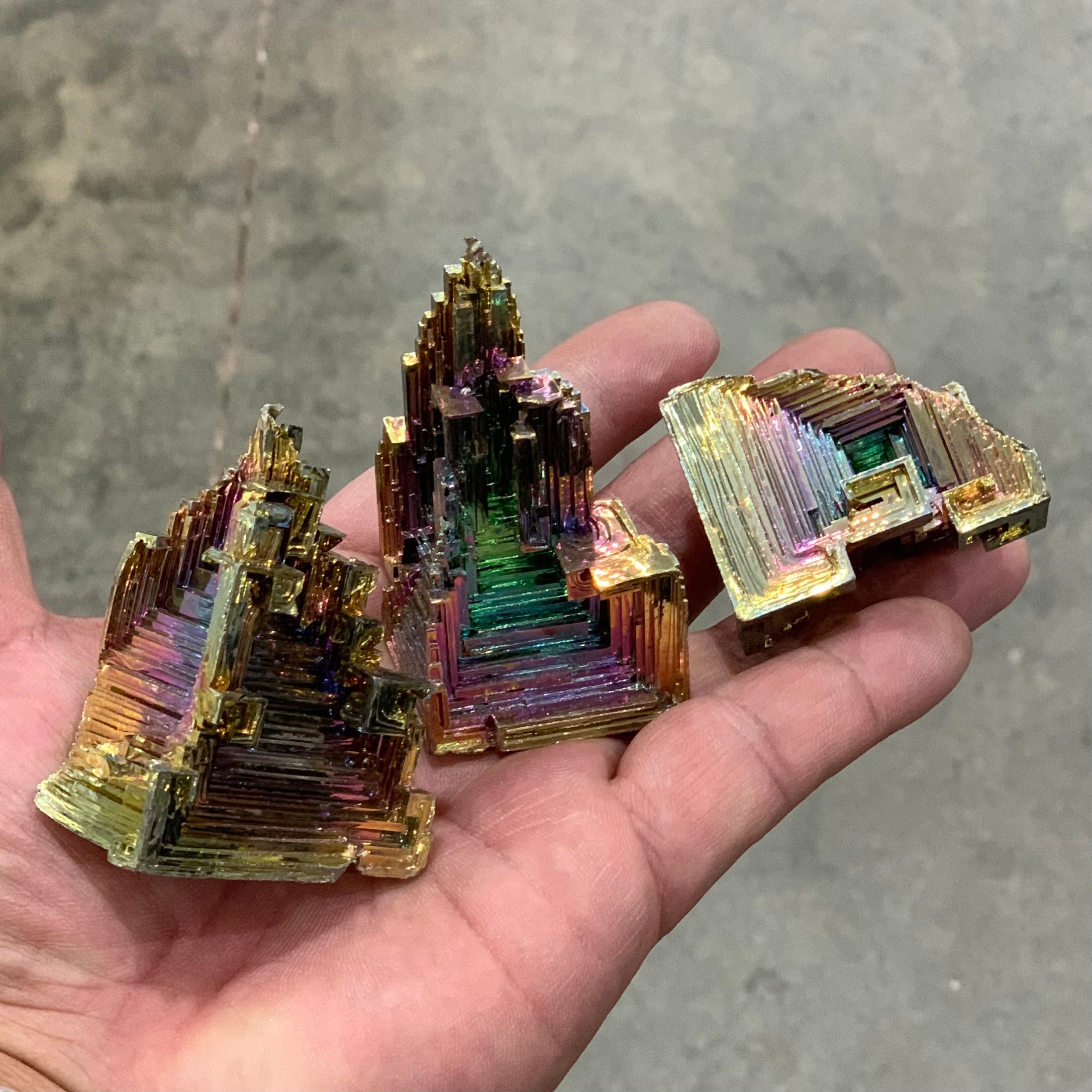 Bismuth crystal clusters with iridescent rainbow colors in a wholesale lot