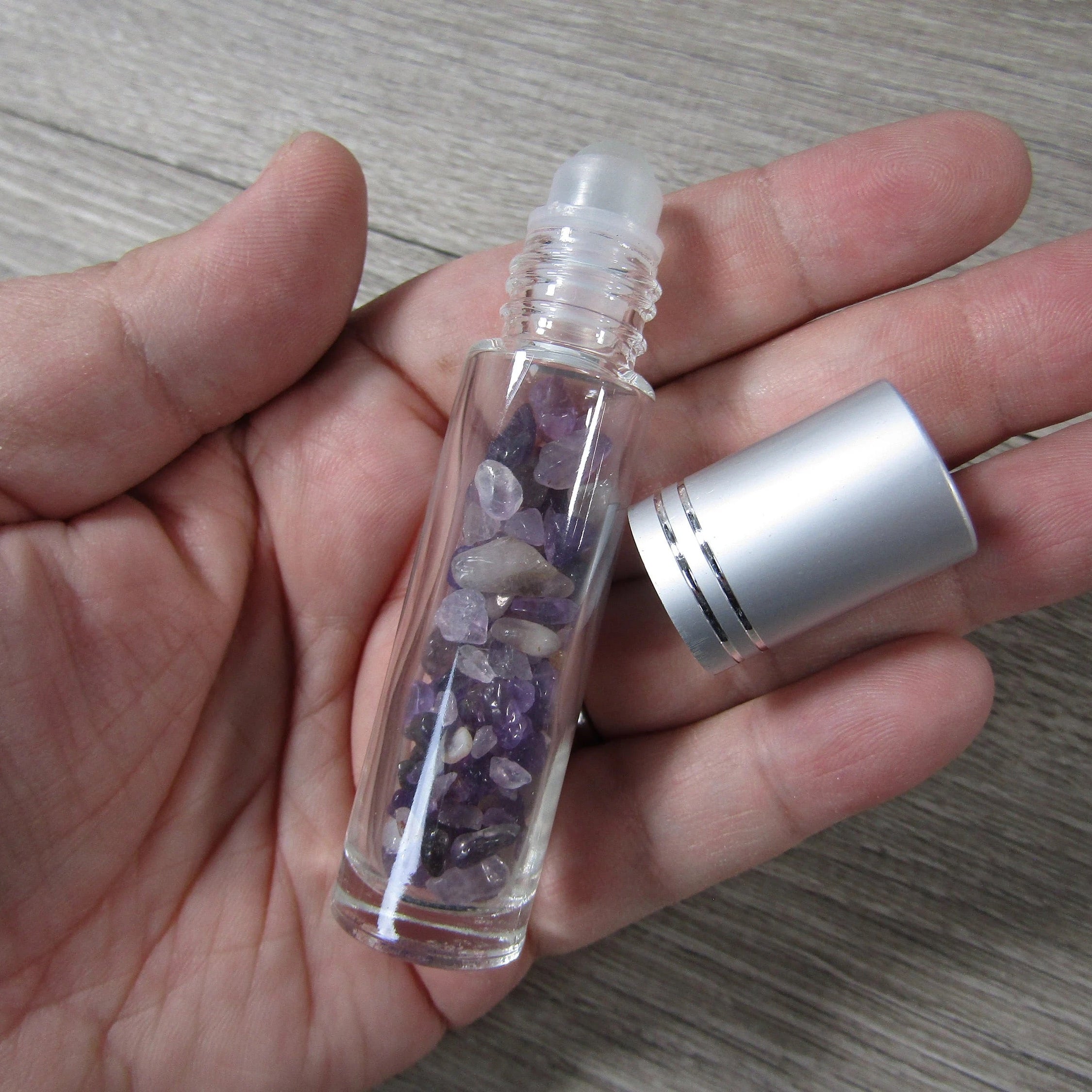 amethyst chips in glass roller bottles for rock shops
