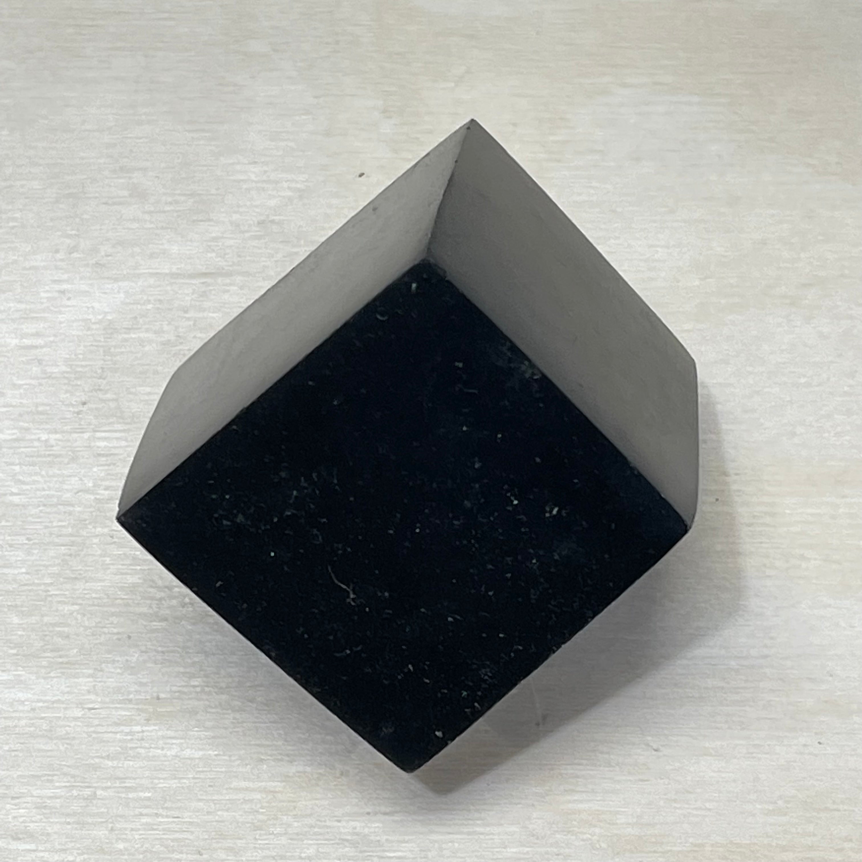 Black Tourmaline polished edge cube measuring 1.25 inches for energy protection, available wholesale.