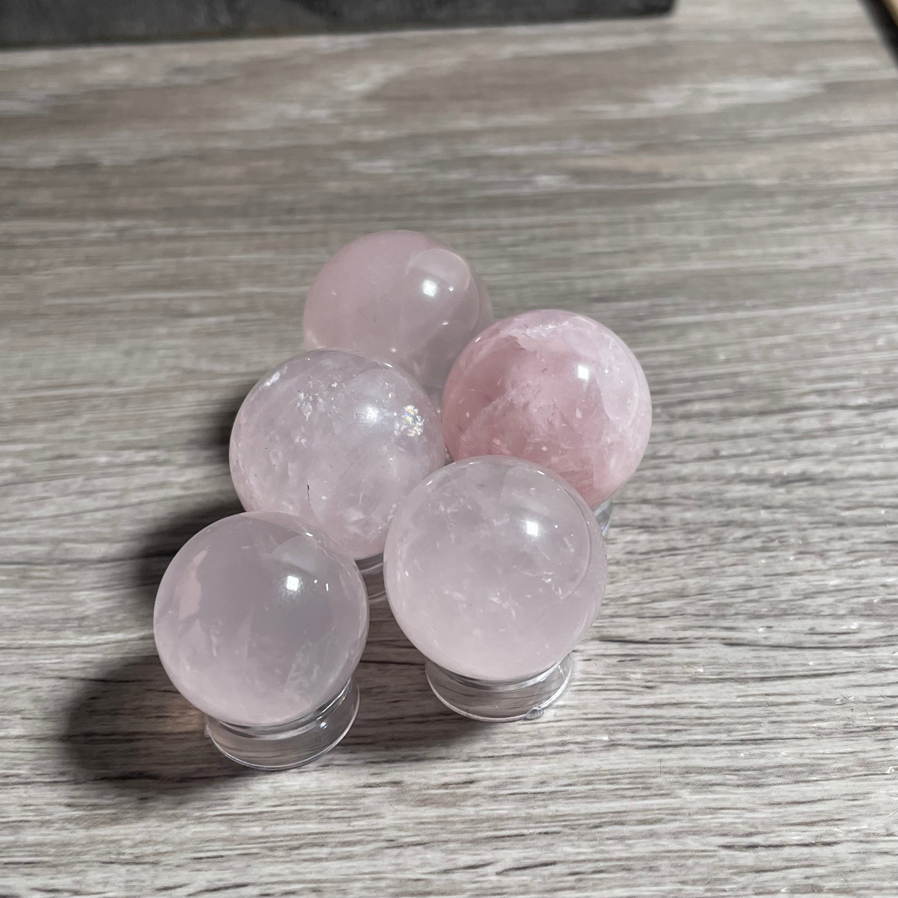 rose quartz crystal ball for retail display