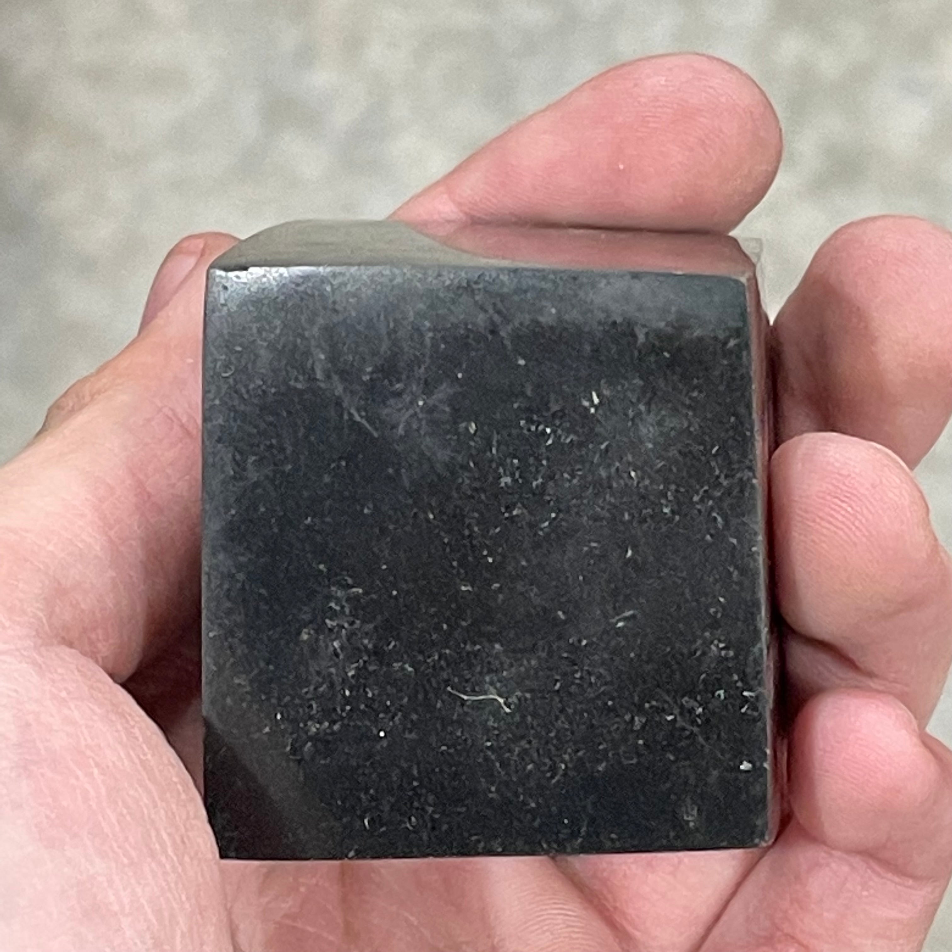 Polished Black Tourmaline cube for meditation and home decor, perfect for wholesale buyers.