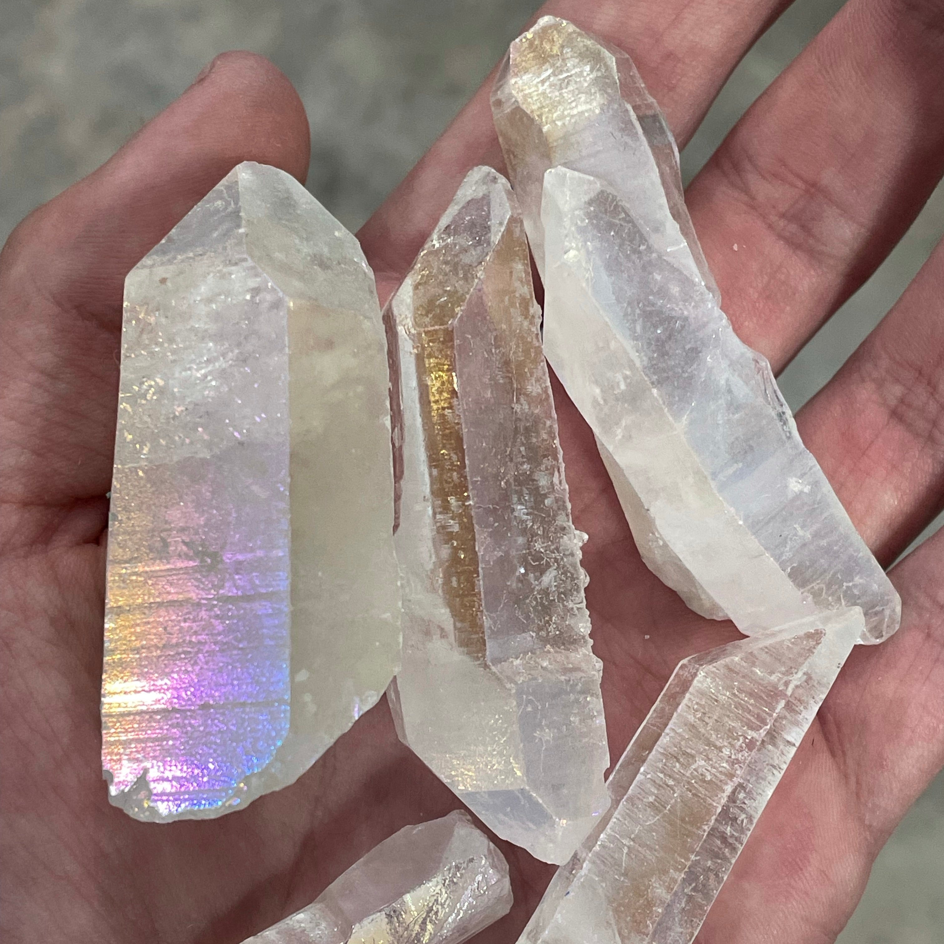 Assorted Sizes of Angel Aura Quartz Raw Points