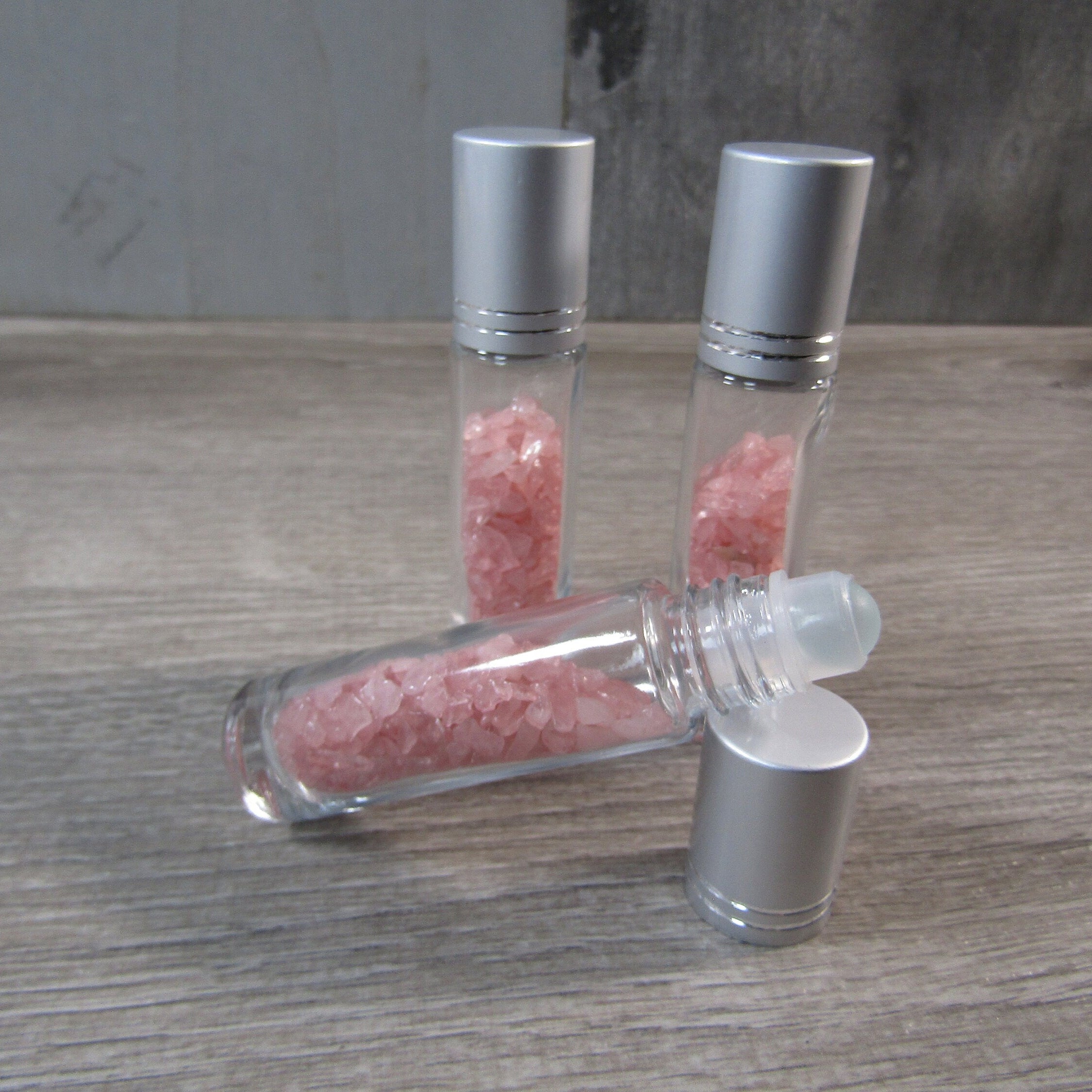 rose quartz glass roller bottles for perfumes and oils