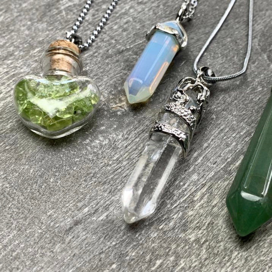 Mixed crystal pendants on chains for metaphysical retail