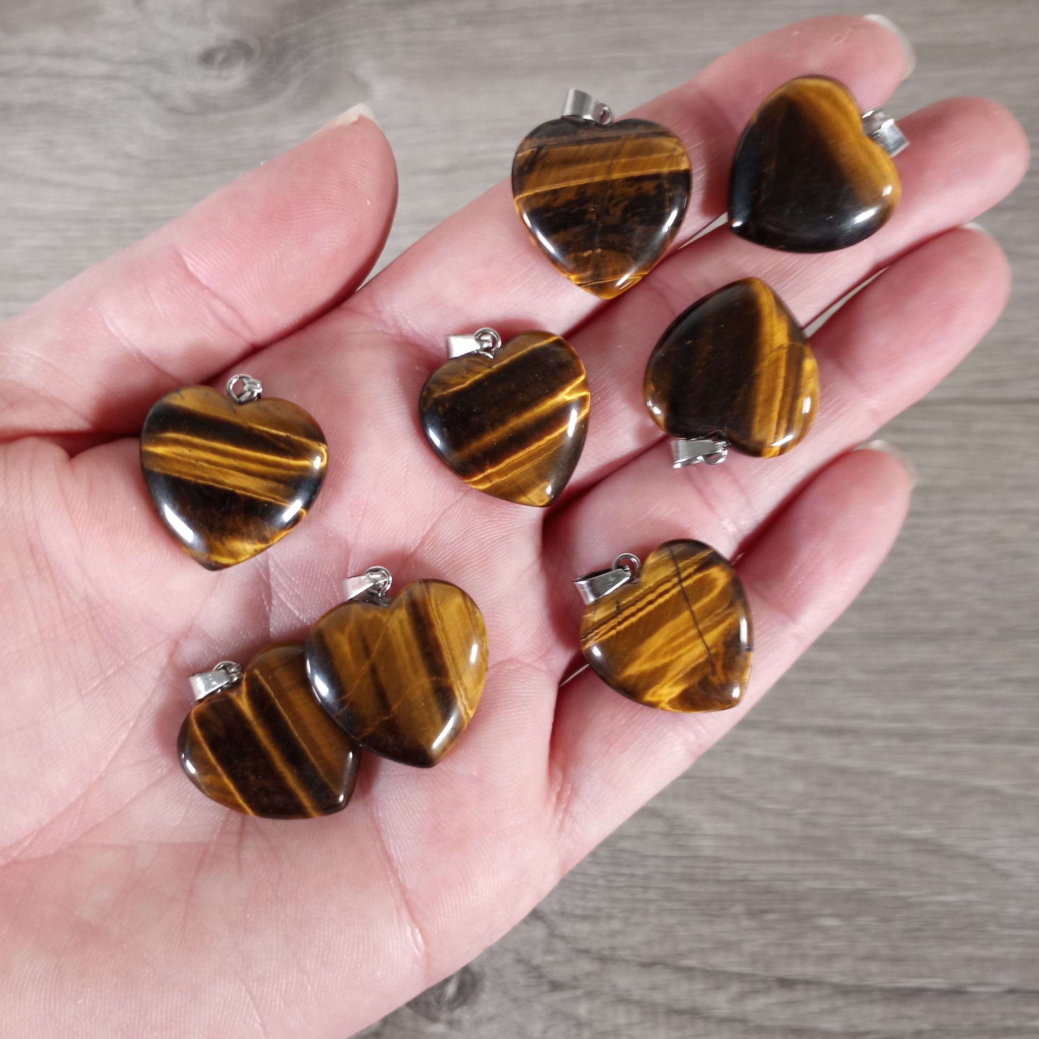 **Tiger eye lightning bolt carvings with golden brown gemstone bands for wholesale crystal and mineral collections**