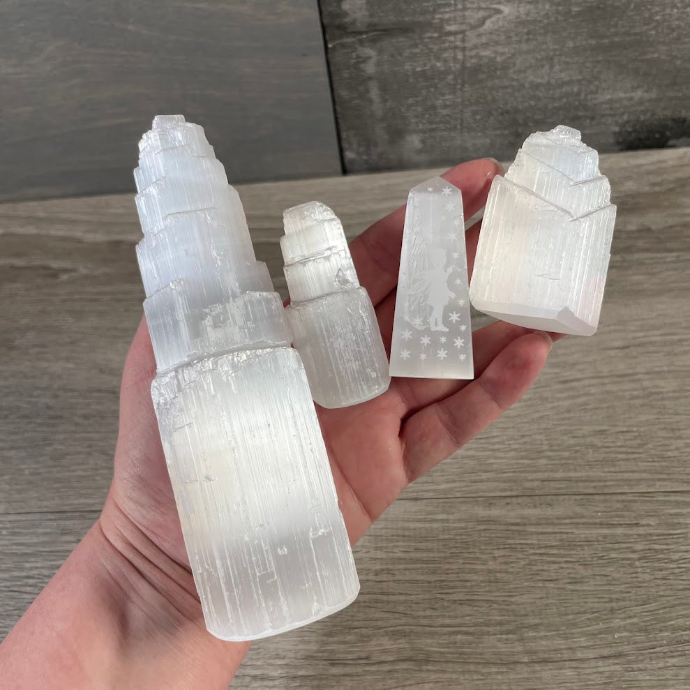**Assorted selenite towers and obelisks with natural white crystal texture for wholesale gemstone and mineral collections**