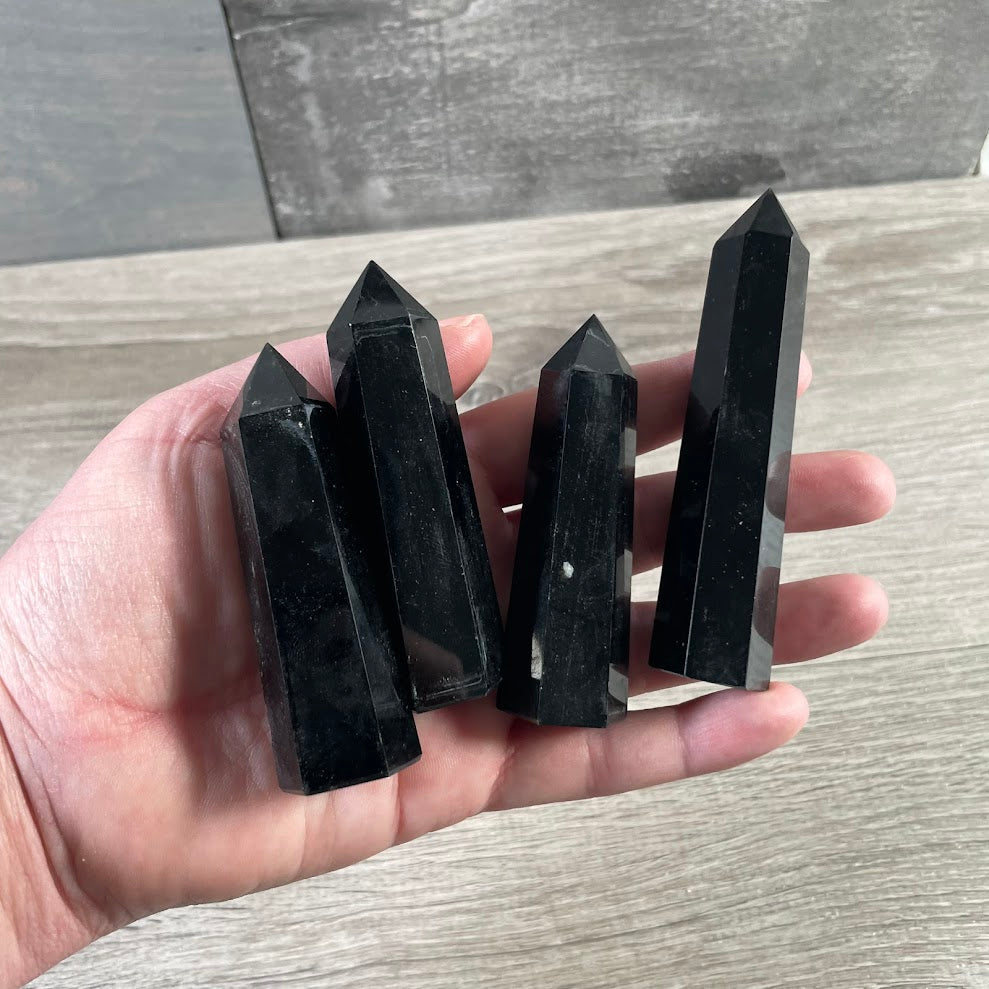 **1-2 oz obsidian obelisks with polished black crystal points for wholesale gemstone and mineral collections**