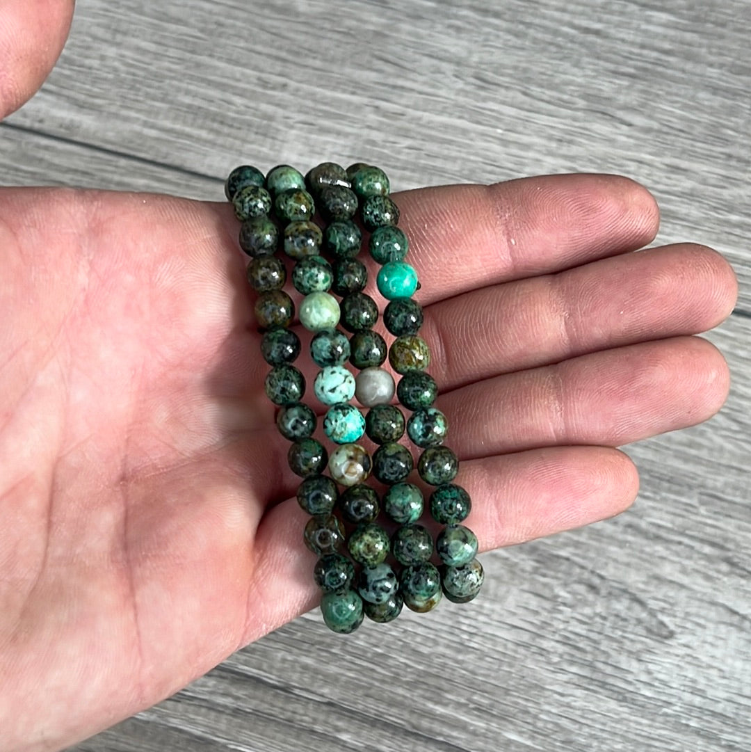 Stretchy bracelet made from 6mm round African turquoise beads