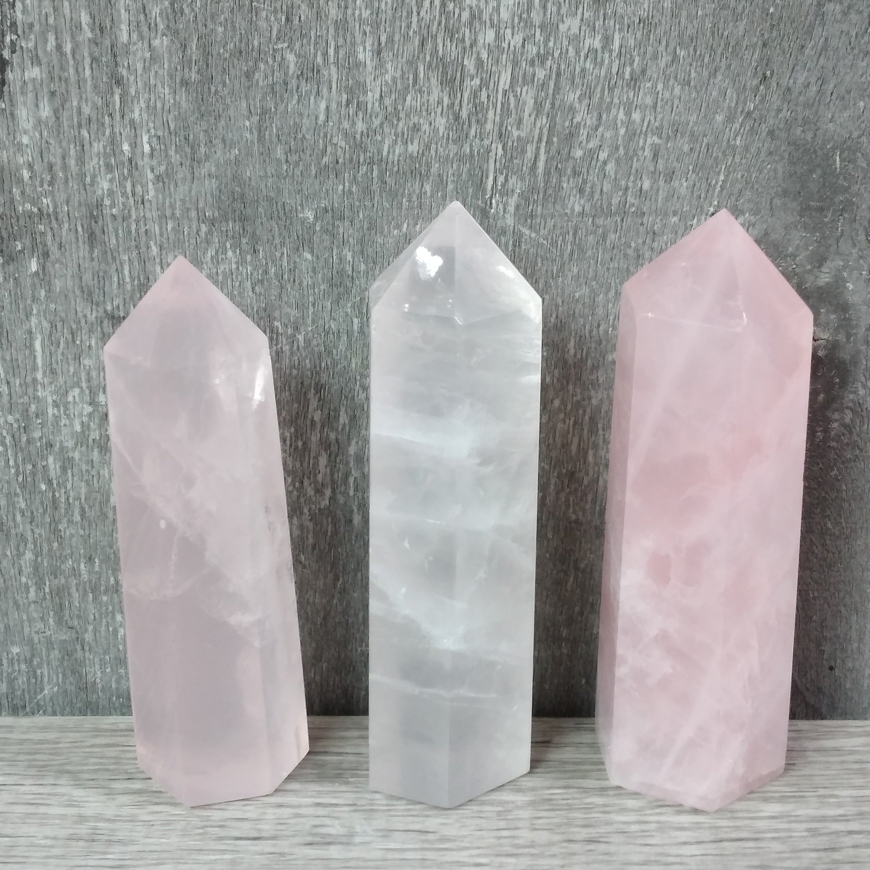 Pink polished obelisks ready for resale or decorative purposes.