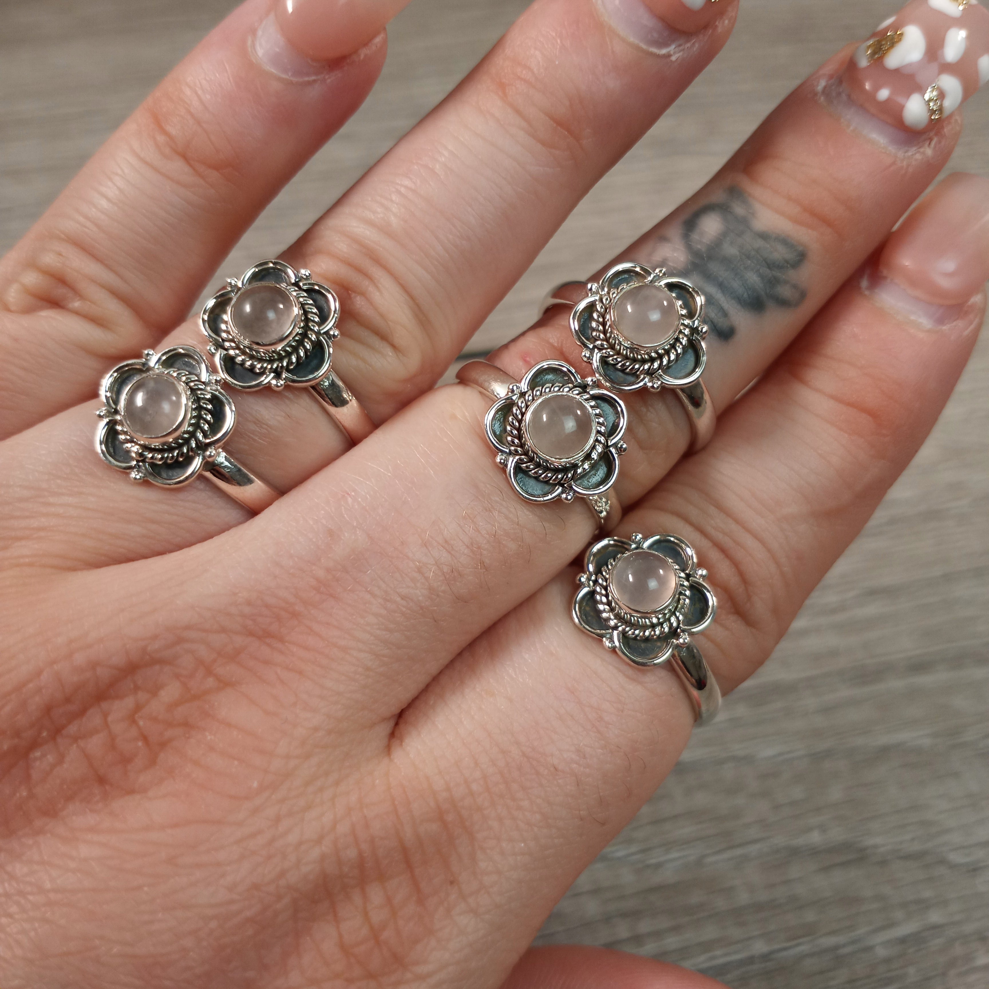 Sterling Silver ring with Boho Flower setting and rose quartz center stone