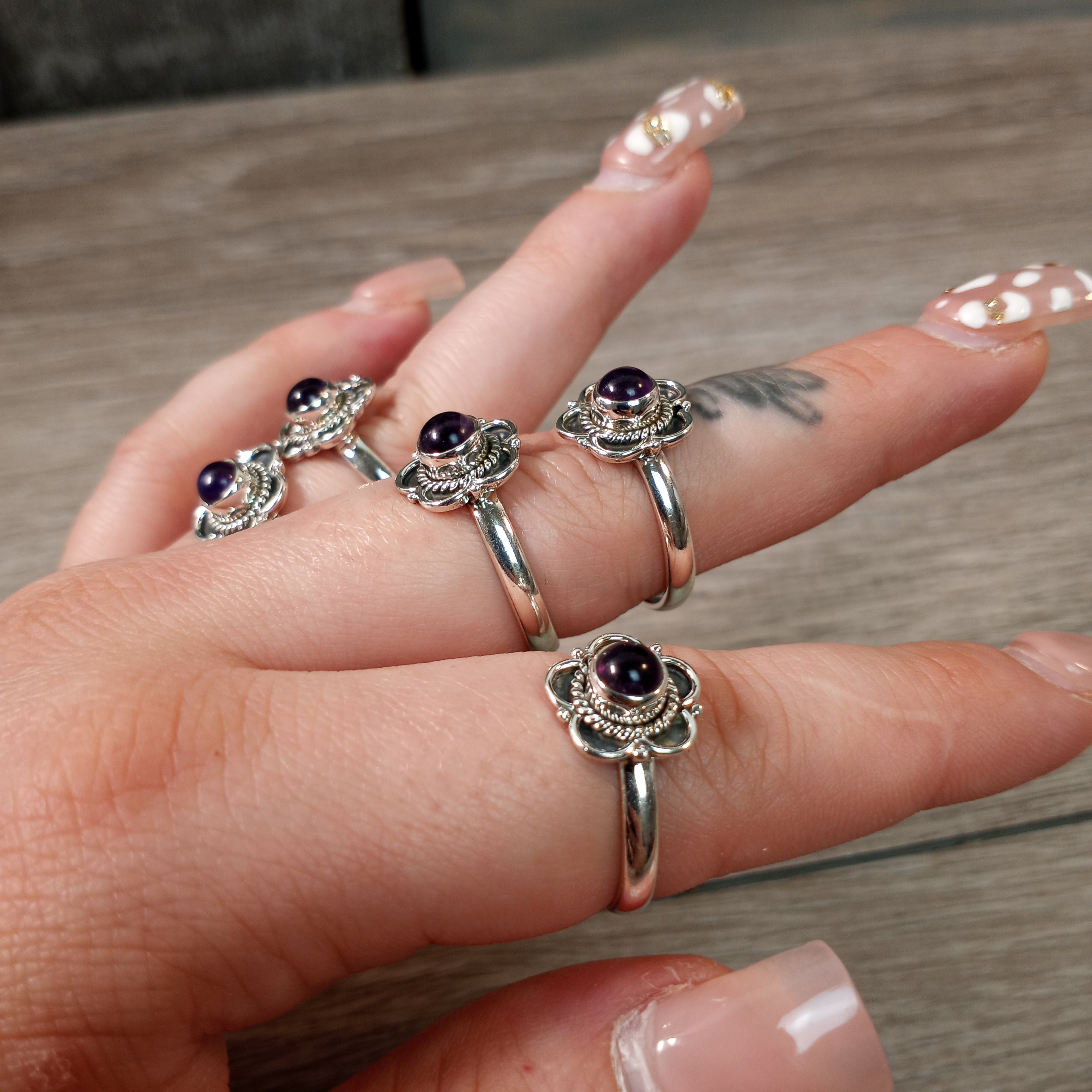 Sterling Silver ring with Boho Flower setting and amethyst center stone