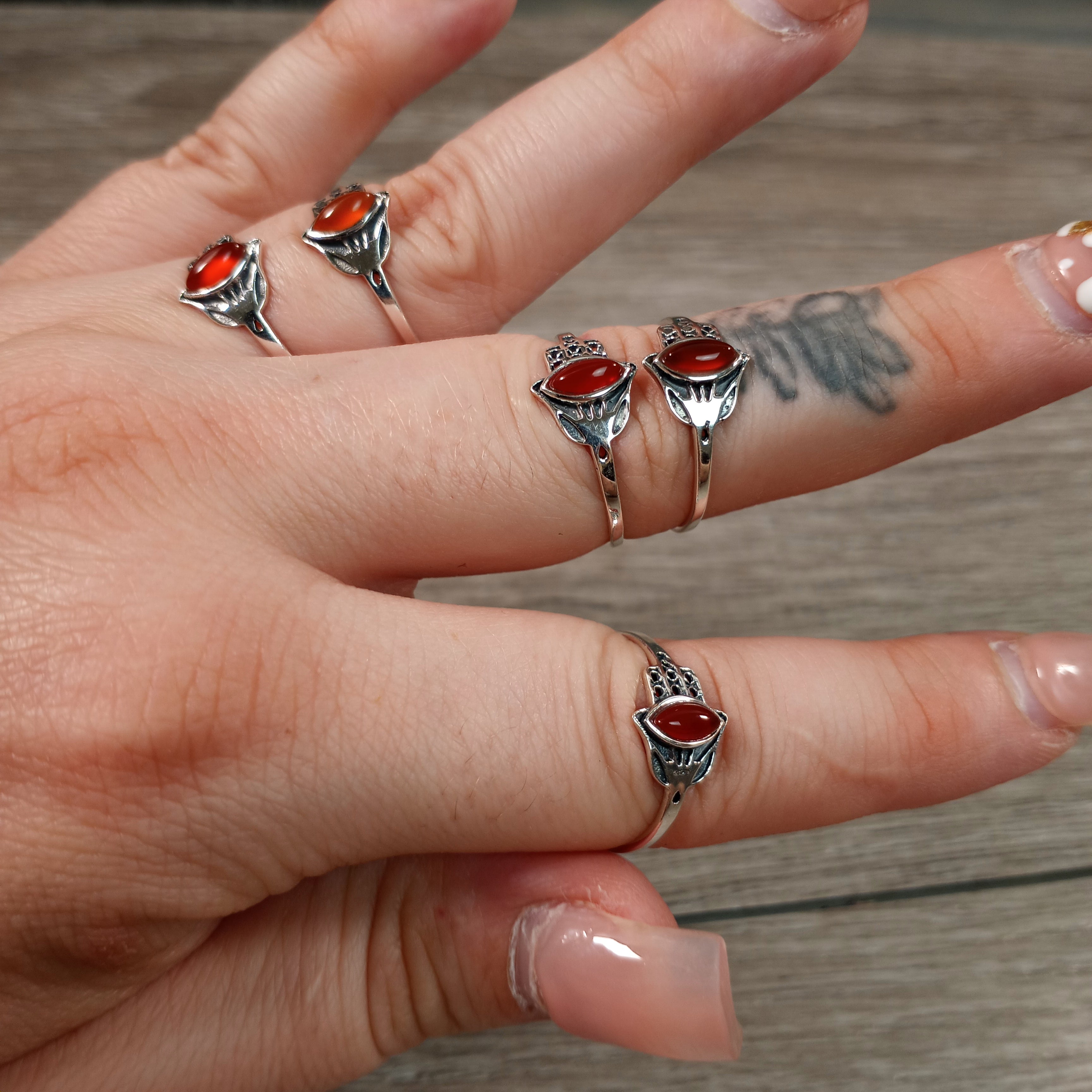 Sterling Silver Ring with Hamsa Hand setting and carnelian center stone