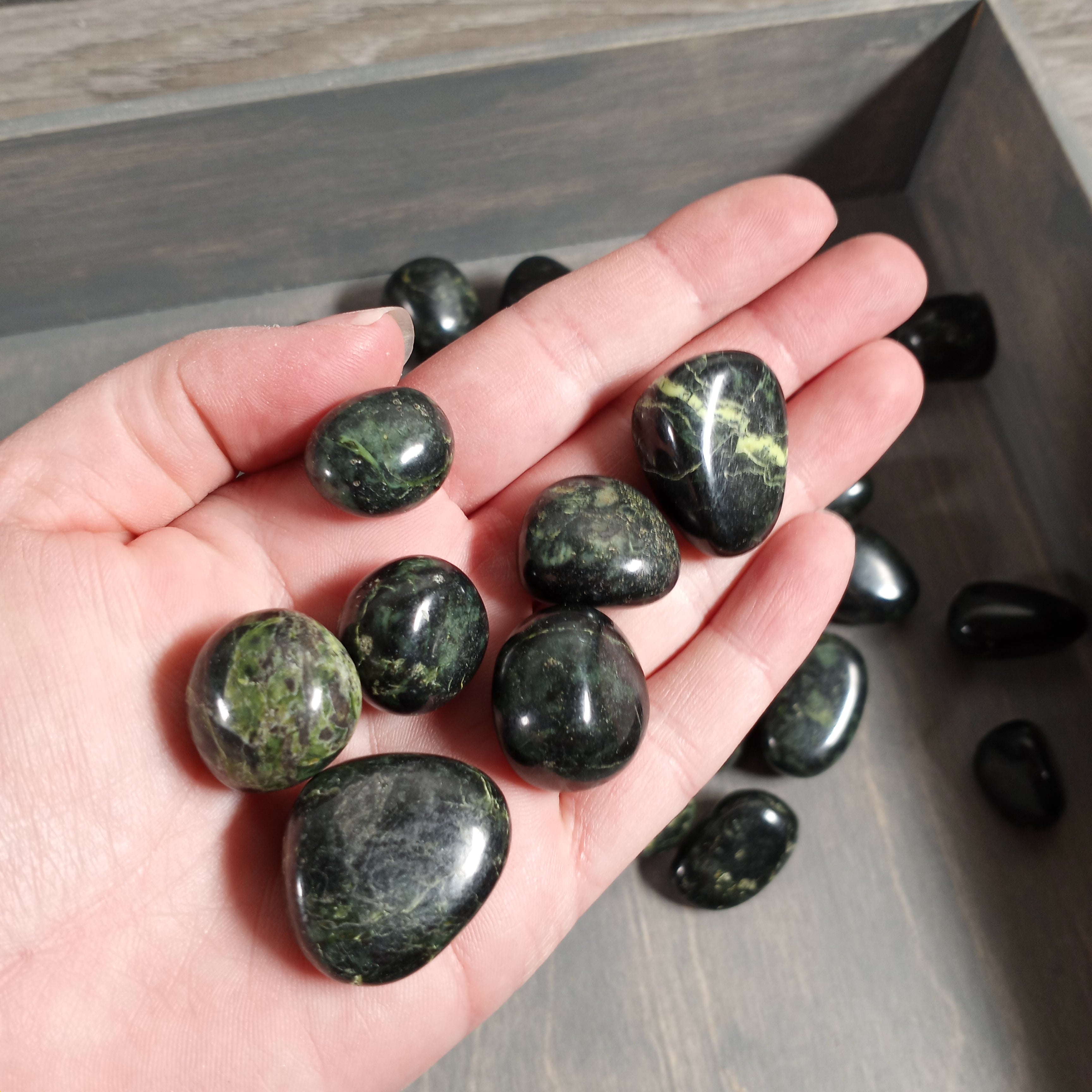 Black Nephrite Jade tumbled stones in bulk by the pound.