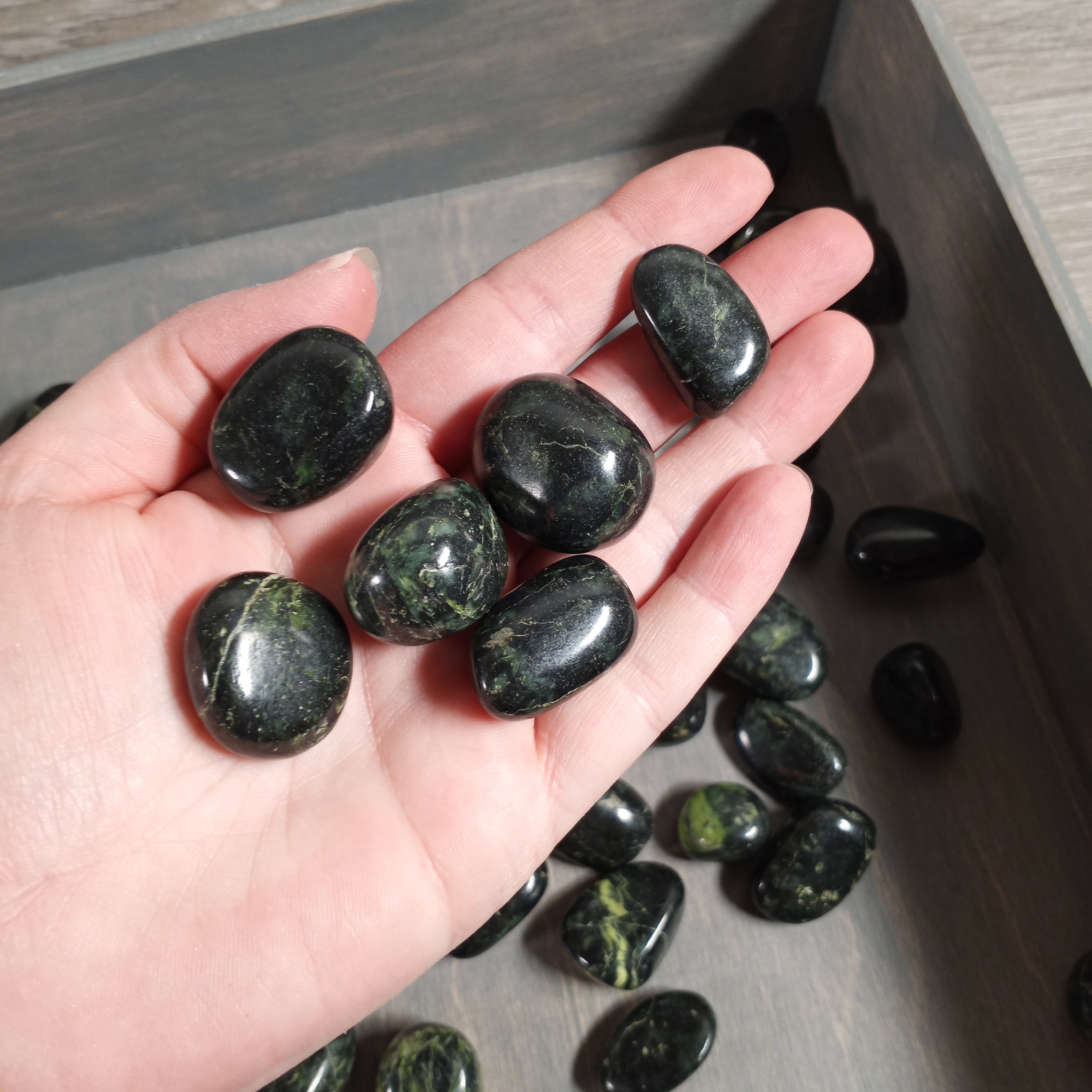 High-quality Black Nephrite Jade stones for meditation and crystal healing.